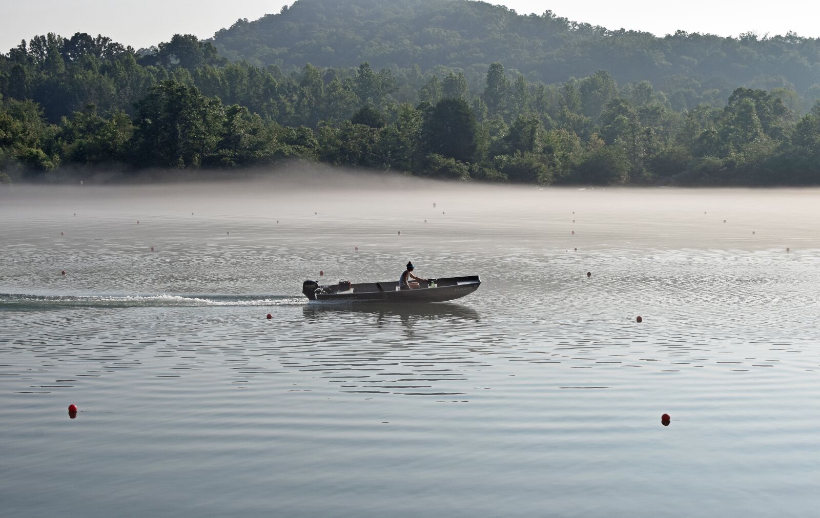 Nikon D3300 sample photo. Boater in fog, early photography