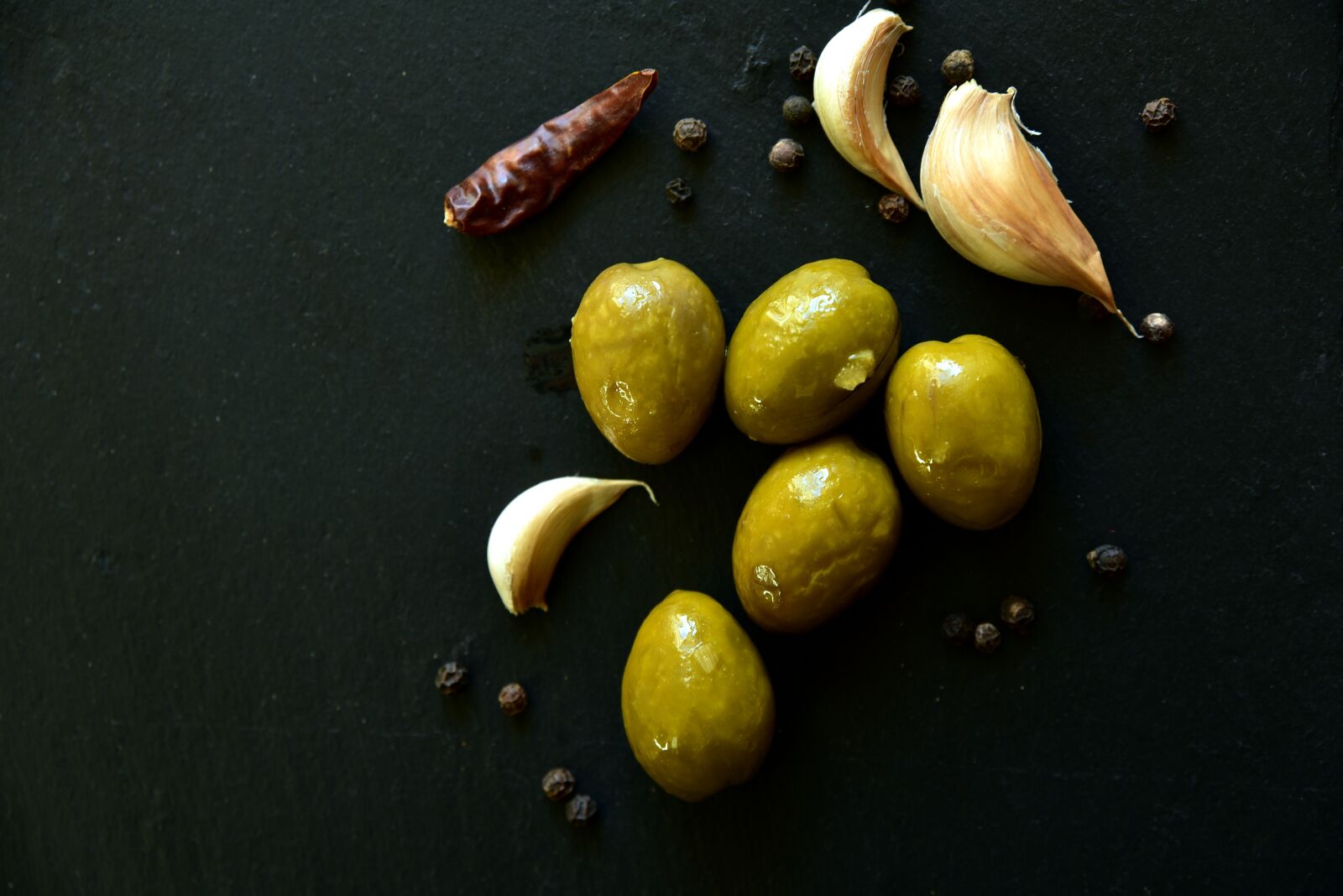 Nikon D750 sample photo. Olives, garlic, pepper photography