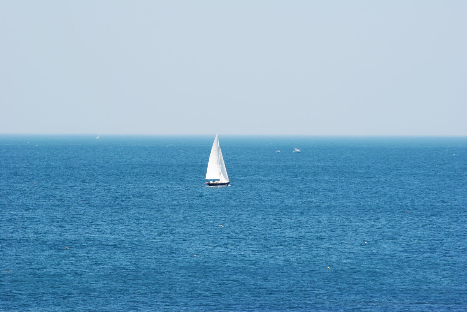 Nikon D3000 sample photo. Sailboat, lone sailboat, serenity photography