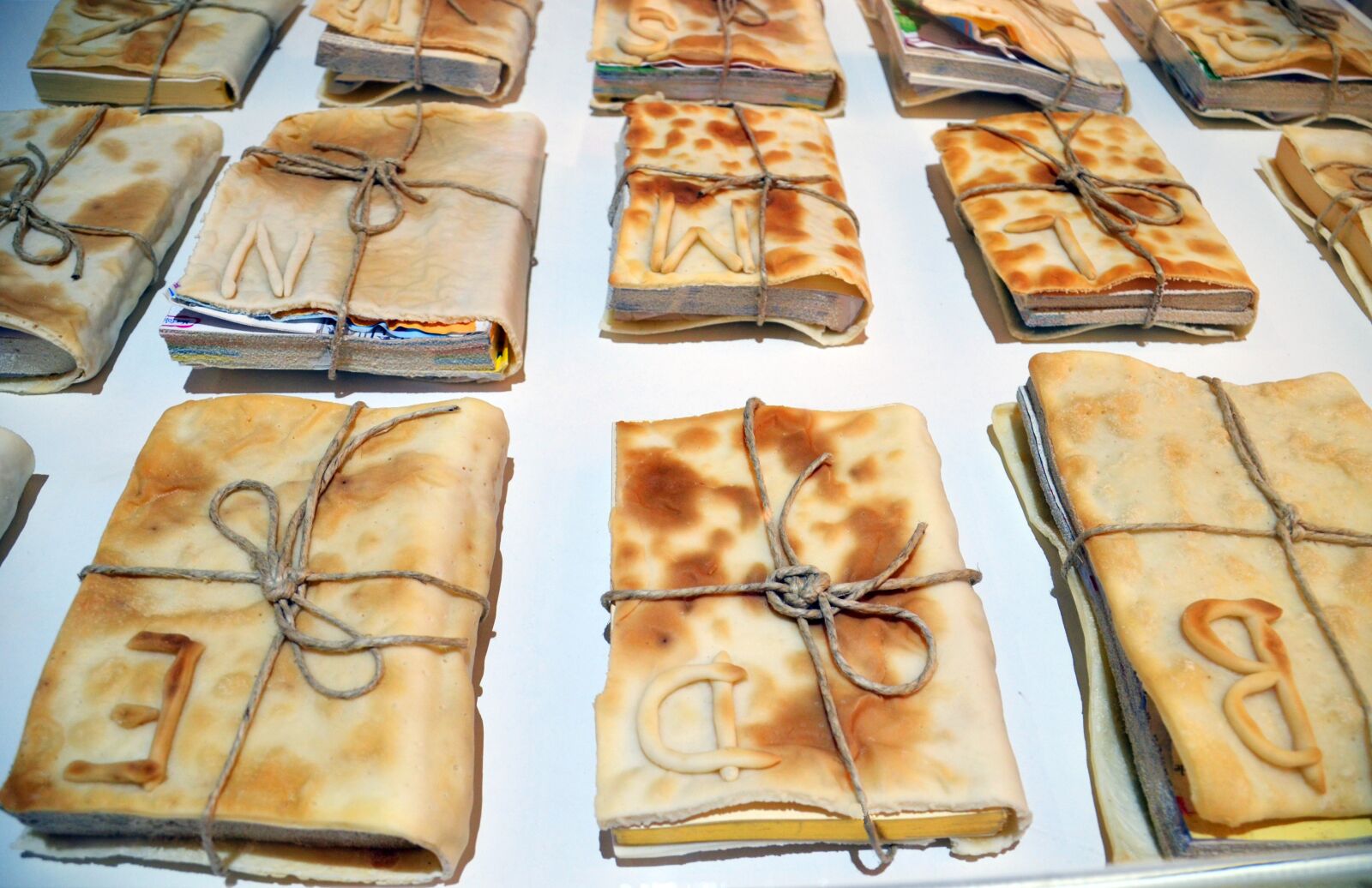 Nikon D7000 sample photo. Books, pizza, dough photography