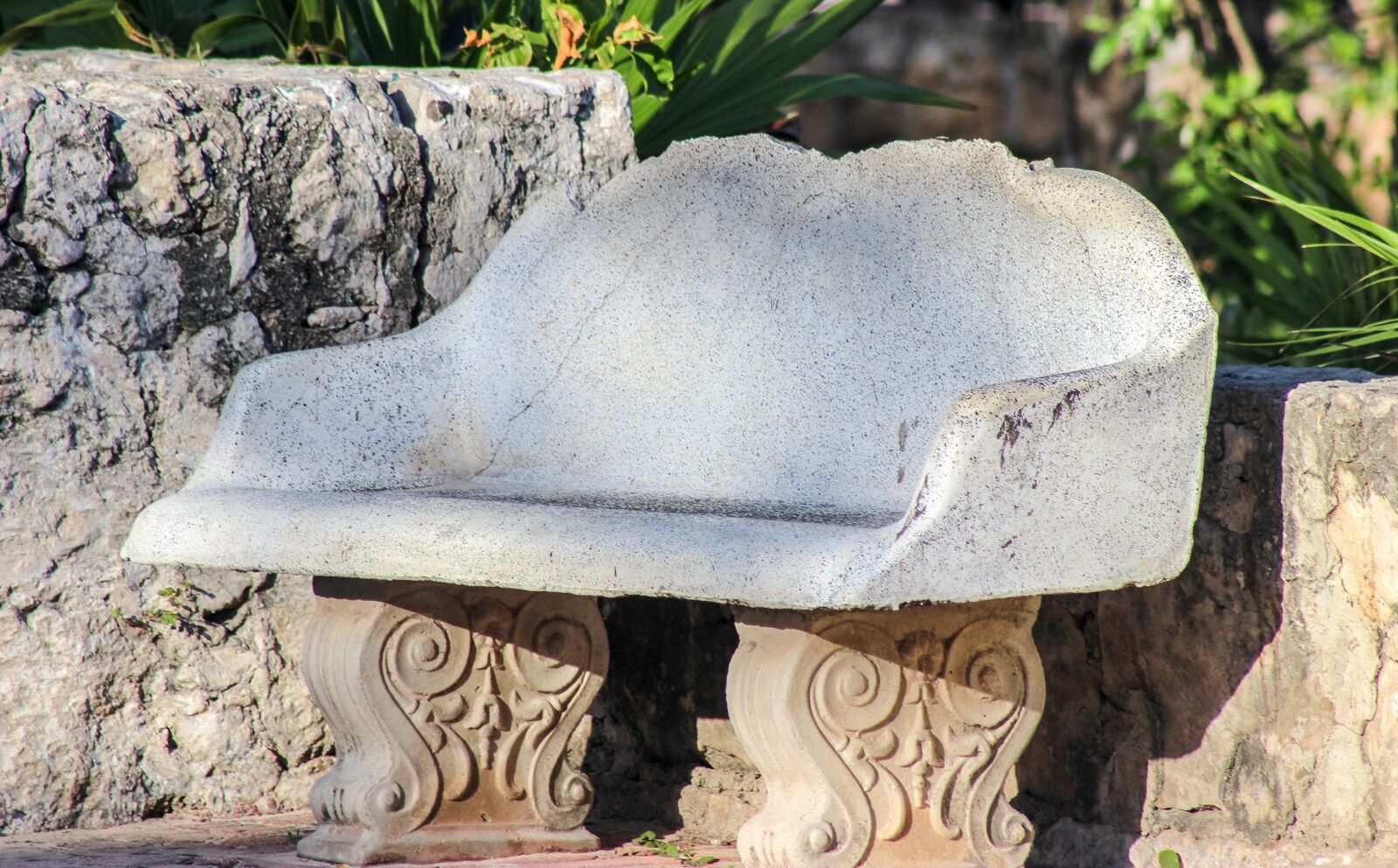 Canon EF75-300mm f/4-5.6 sample photo. Bench, cement bench, rock photography