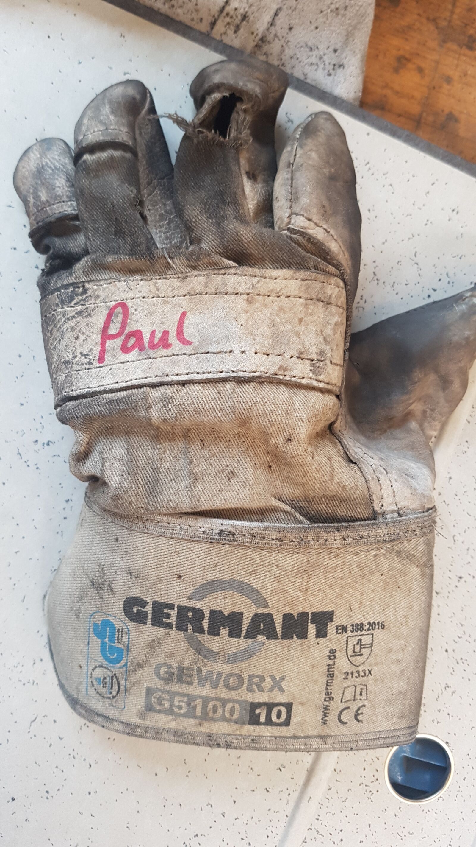 Samsung Galaxy S7 Edge sample photo. Work, gloves, dirt photography