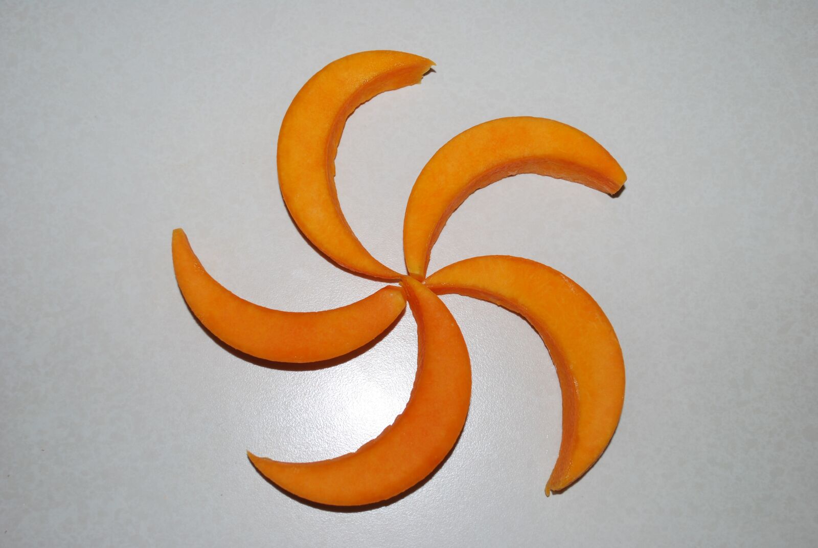 Nikon D60 sample photo. Cantaloupe, crescent, slices photography