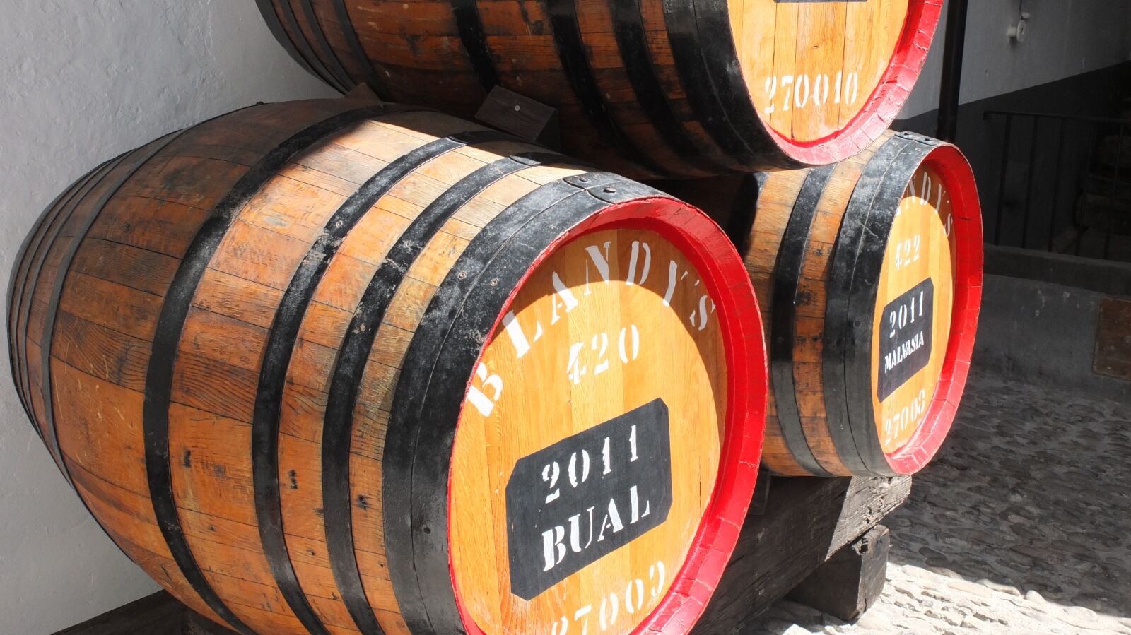 Fujifilm X10 sample photo. Barrels, madeira, wine photography