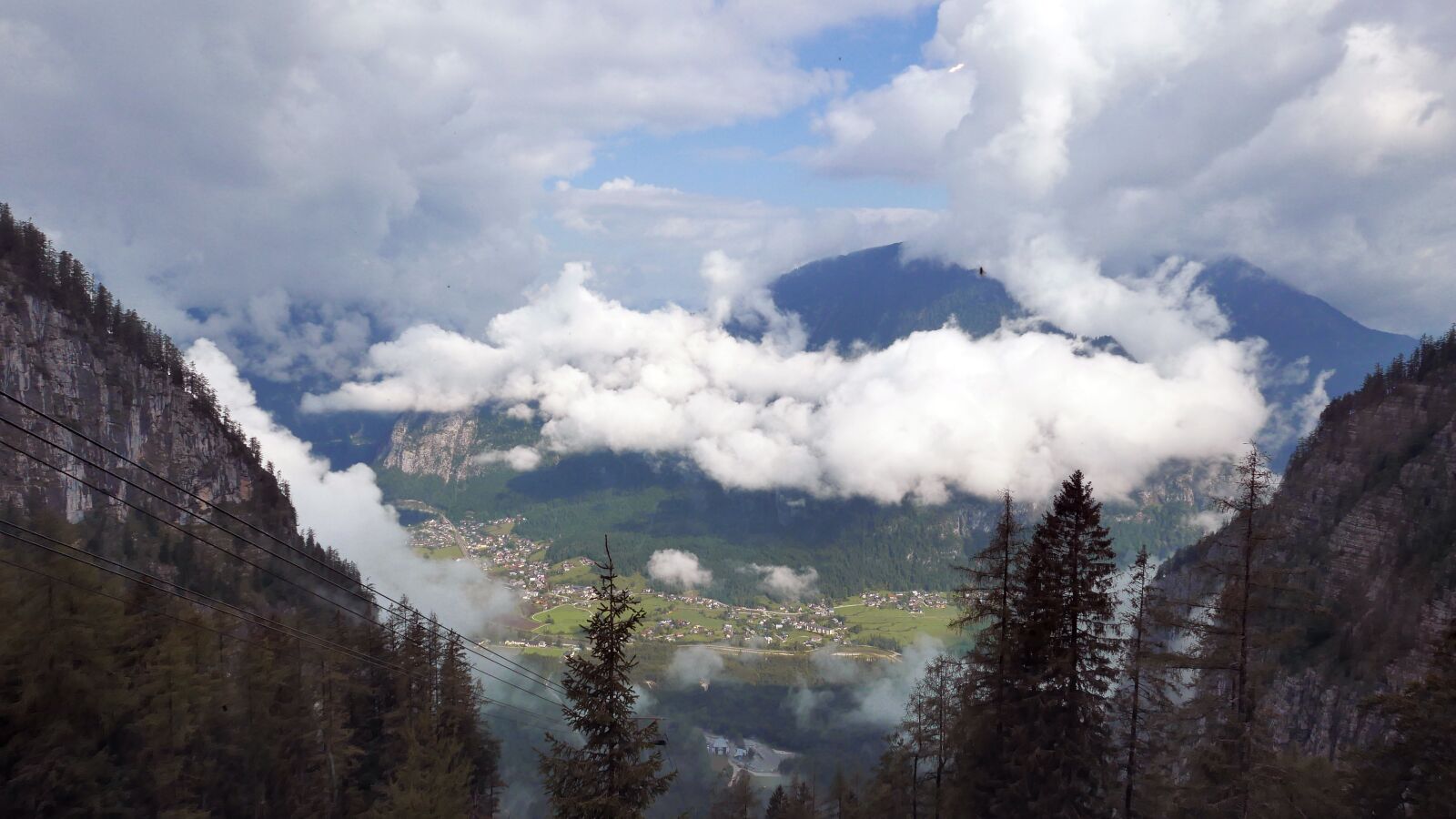 Panasonic Lumix DMC-LX100 sample photo. Clouds, lift, alpine photography