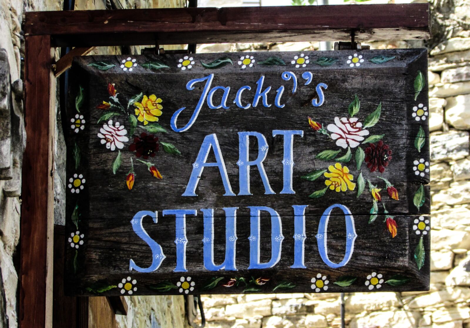 Canon PowerShot SX400 IS sample photo. Sign, art studio, street photography