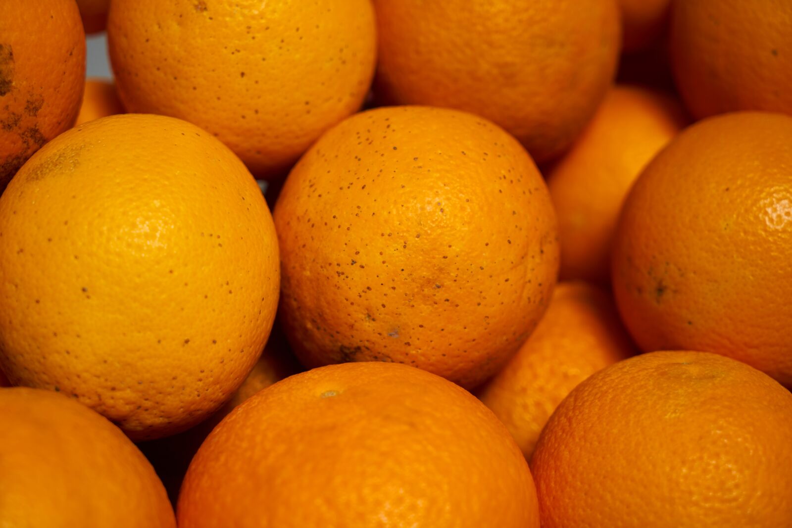 Sony a7R II sample photo. Orange, juicy, vegan photography