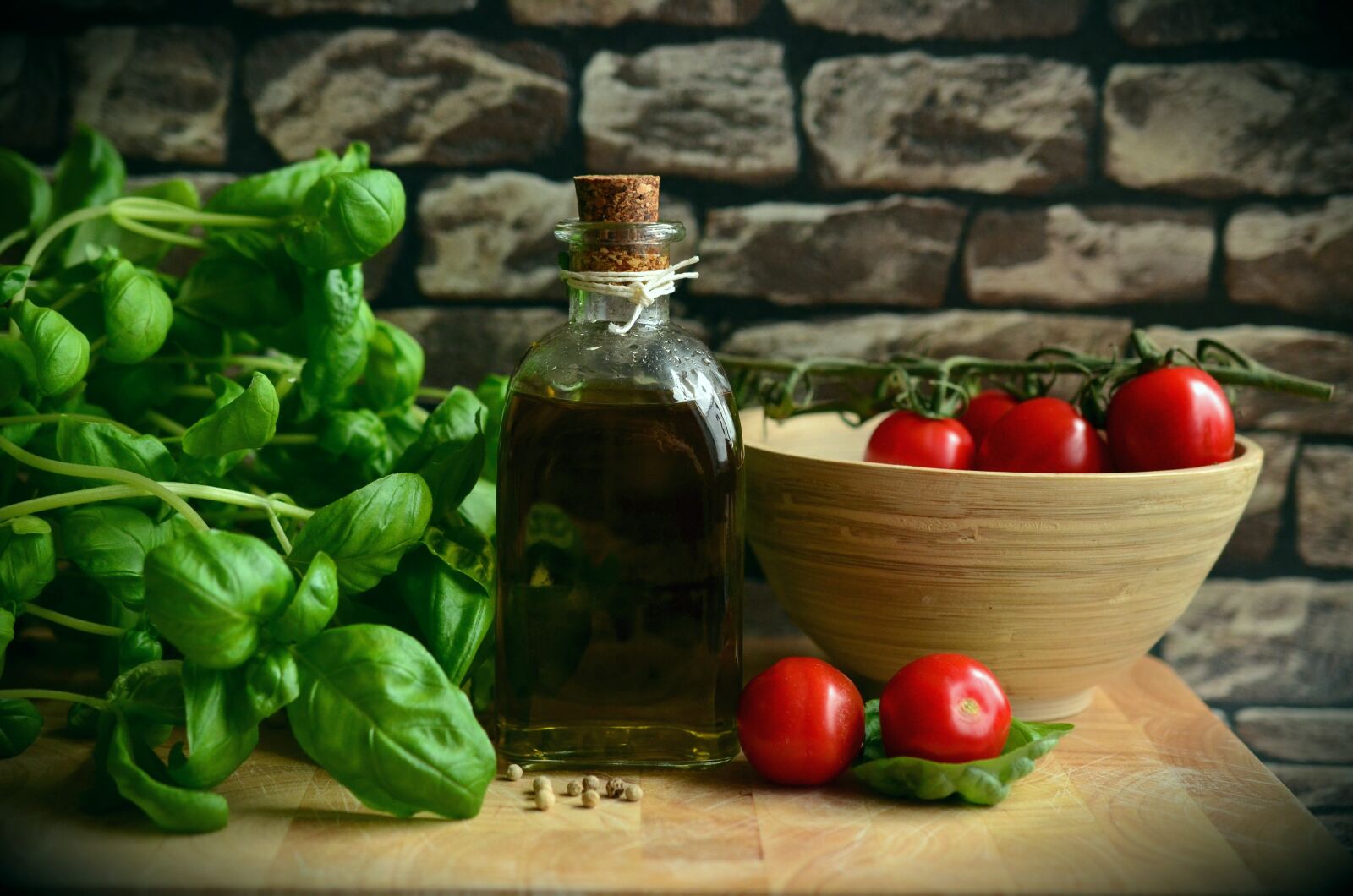 Nikon D5100 sample photo. Olive oil, tomatoes, basil photography