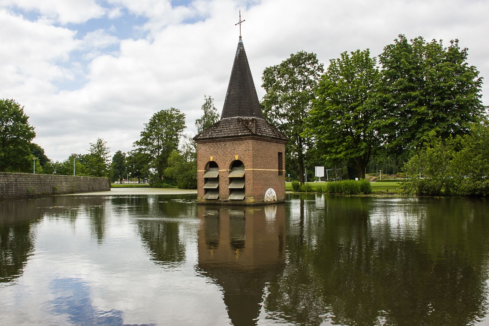 Canon EOS 550D (EOS Rebel T2i / EOS Kiss X4) sample photo. Church tower, water, landscape photography