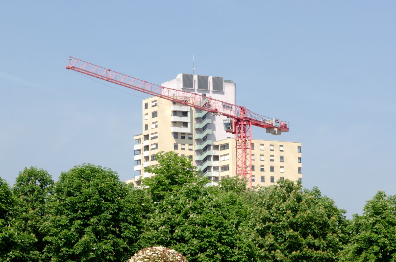 Nikon D5100 sample photo. House, skyscraper, crane photography
