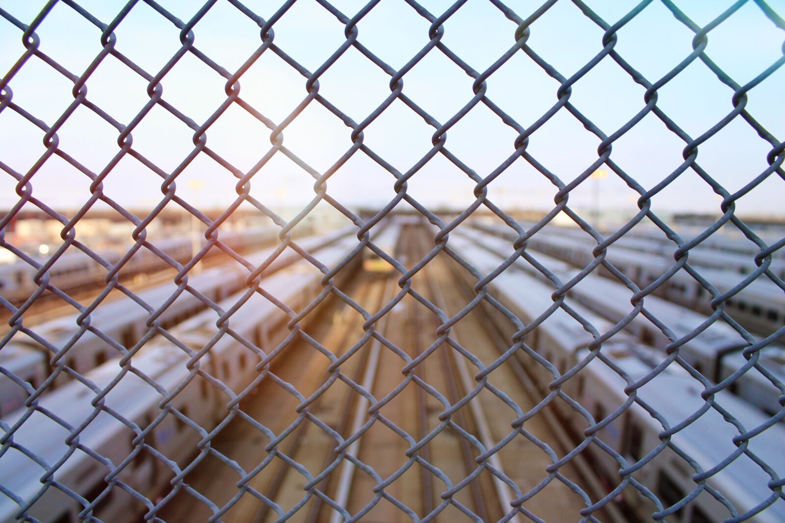 Canon EOS 1100D (EOS Rebel T3 / EOS Kiss X50) sample photo. Fence, trains, new york photography