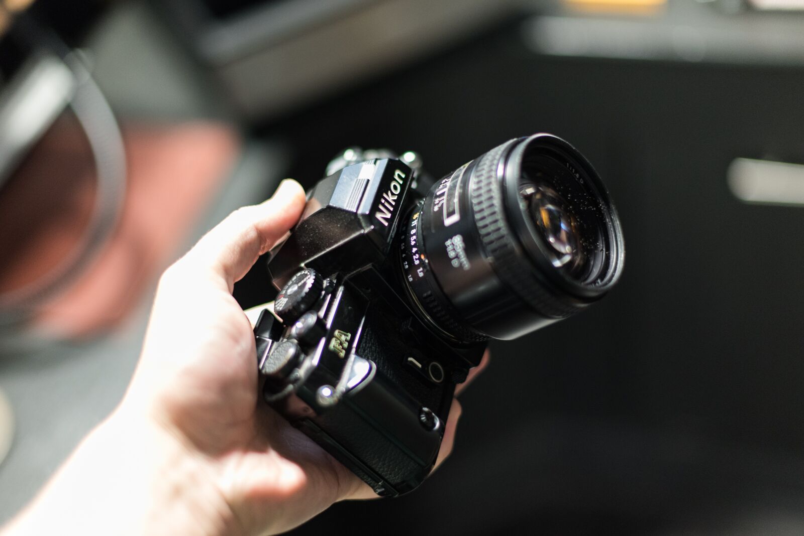 Nikon D750 sample photo. Camera, hand, lens photography
