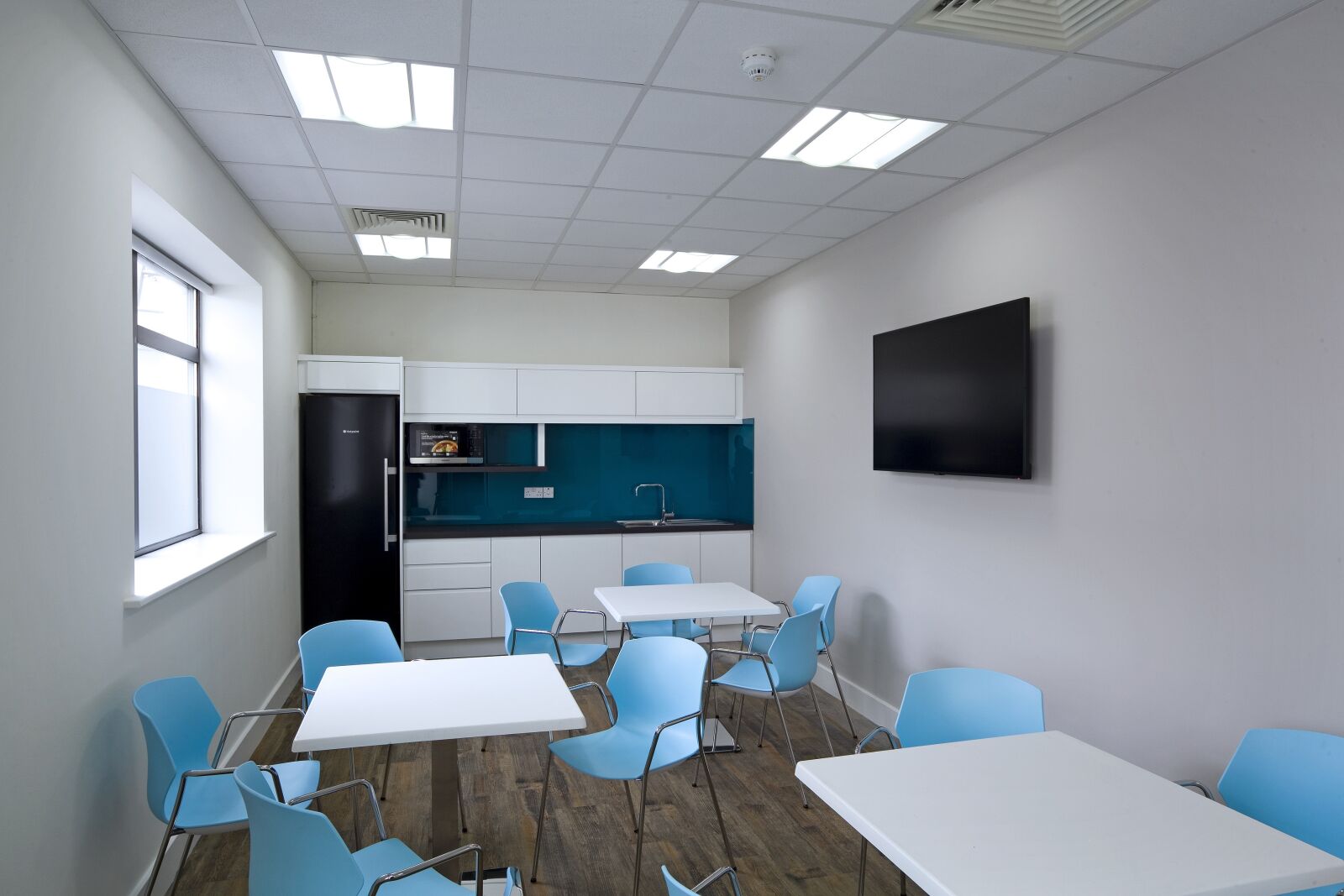 Canon EOS 5D Mark II sample photo. Canteen, blue, seating photography