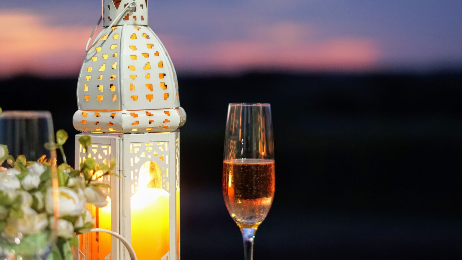 Sony FE 50mm F1.8 sample photo. Candle, candlelight, champagne, champagne photography