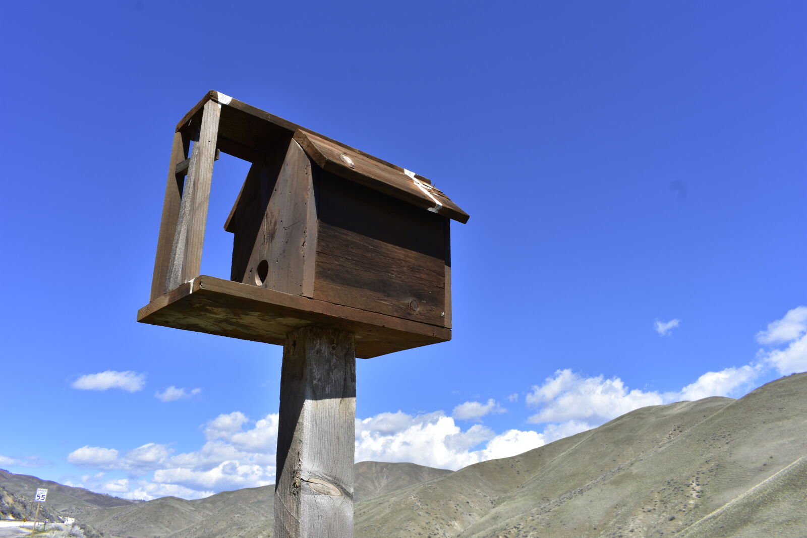 Nikon AF-P DX Nikkor 18-55mm F3.5-5.6G sample photo. Birdhouse photography