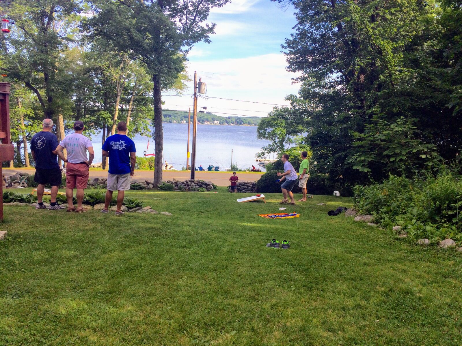iPhone 5s back camera 4.15mm f/2.2 sample photo. Cornhole, family, reunion, lake photography