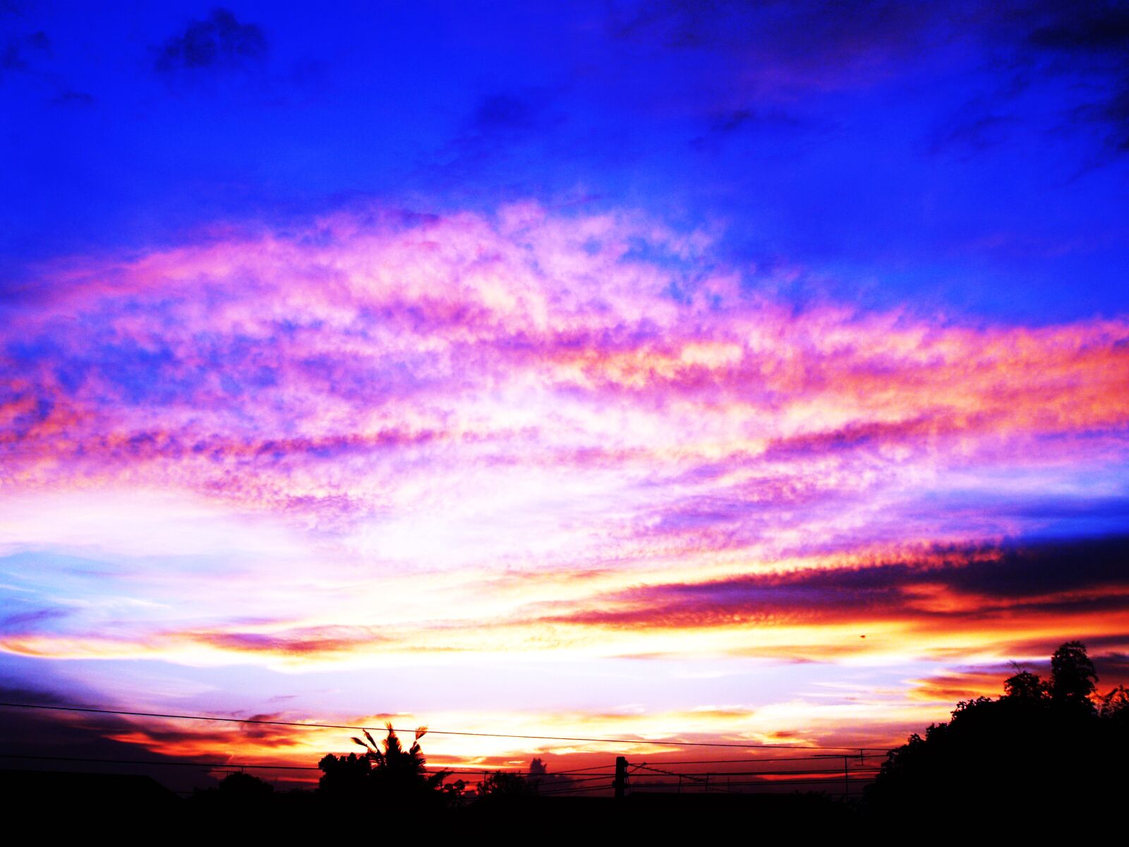 Olympus E-300 (EVOLT E-300) sample photo. Afterglow, backlit, clouds, cloudscape photography