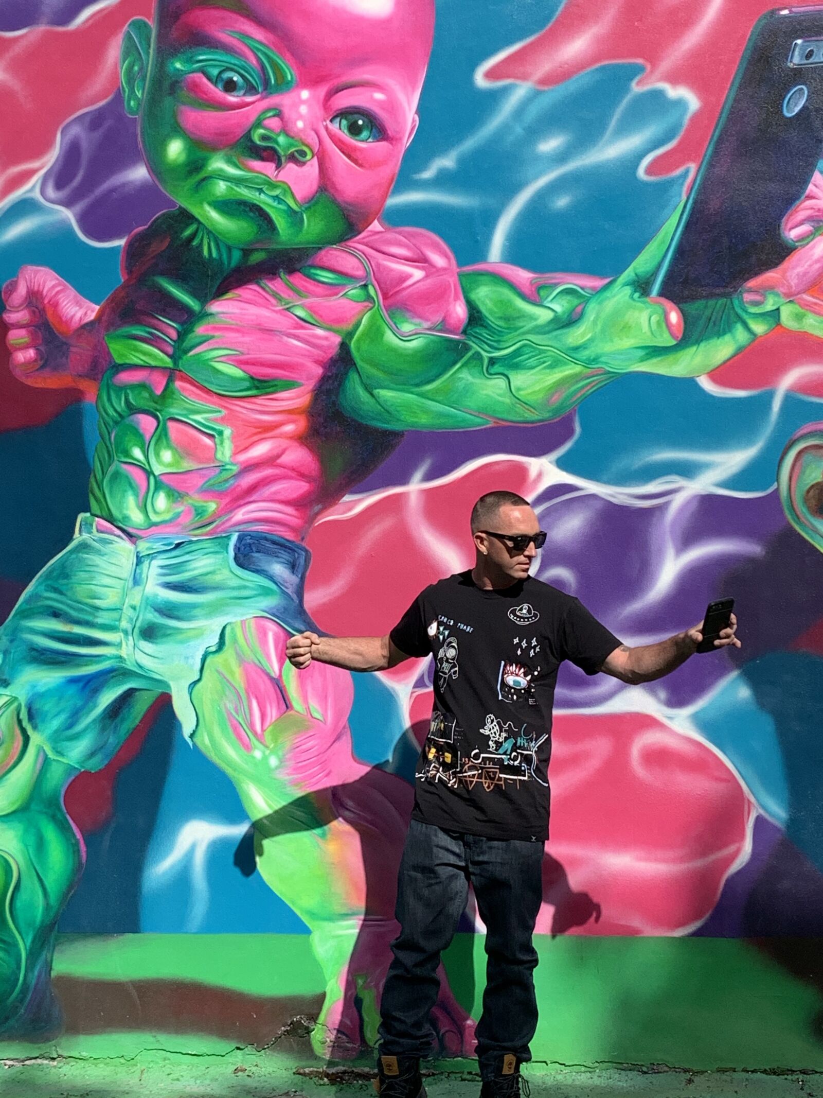 iPhone XR back camera 4.25mm f/1.8 sample photo. Hiphop, graffiti, rapper photography
