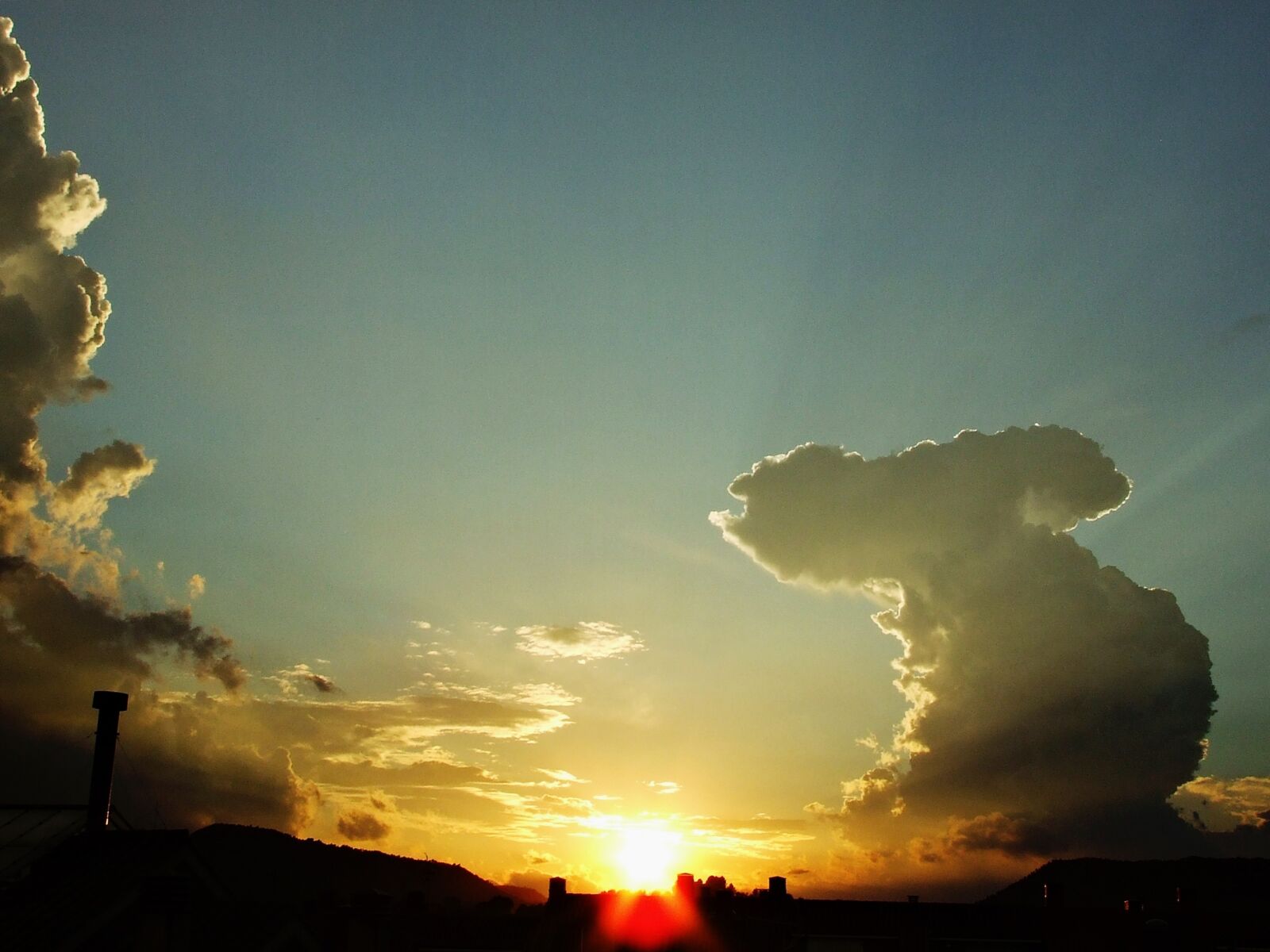 Fujifilm FinePix S5600 sample photo. Clouds, sun, sky photography
