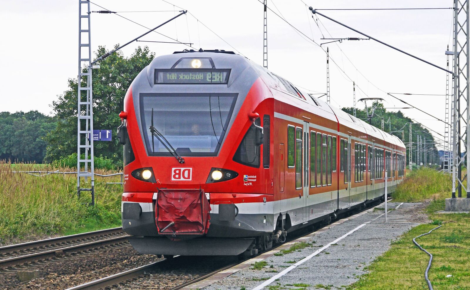 Panasonic Lumix DMC-GH3 sample photo. Locomotive, vehicle, grass, wood photography