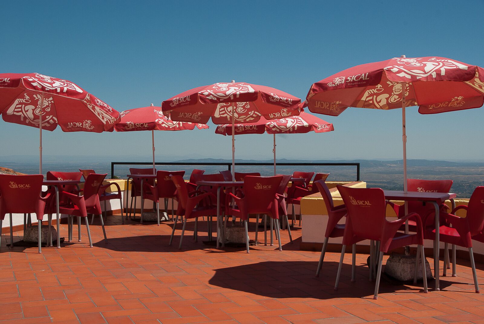 Pentax K10D sample photo. Terrace, bar, parasols photography