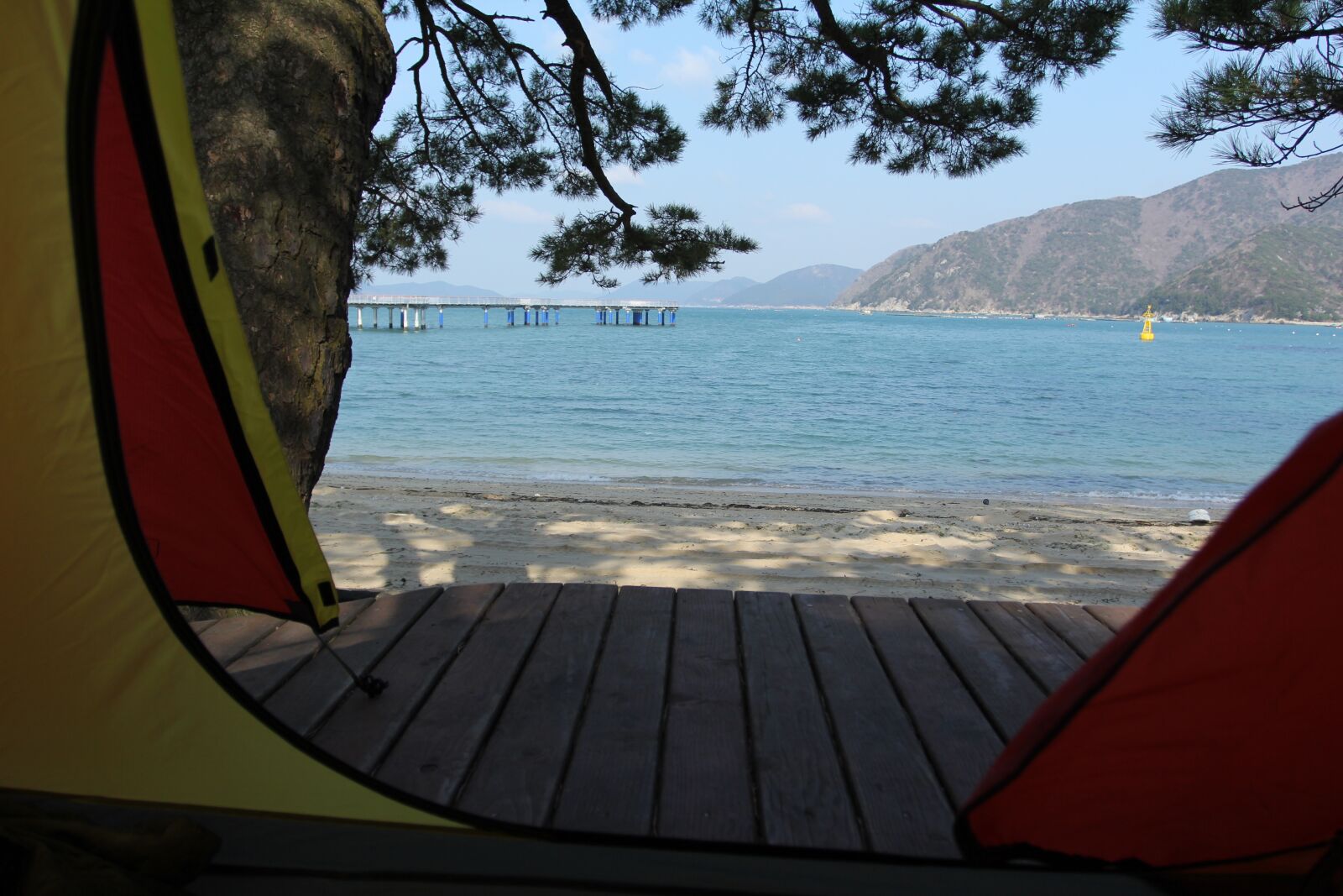 Canon EOS 60D + Canon EF 17-40mm F4L USM sample photo. Tent, camping, sea photography
