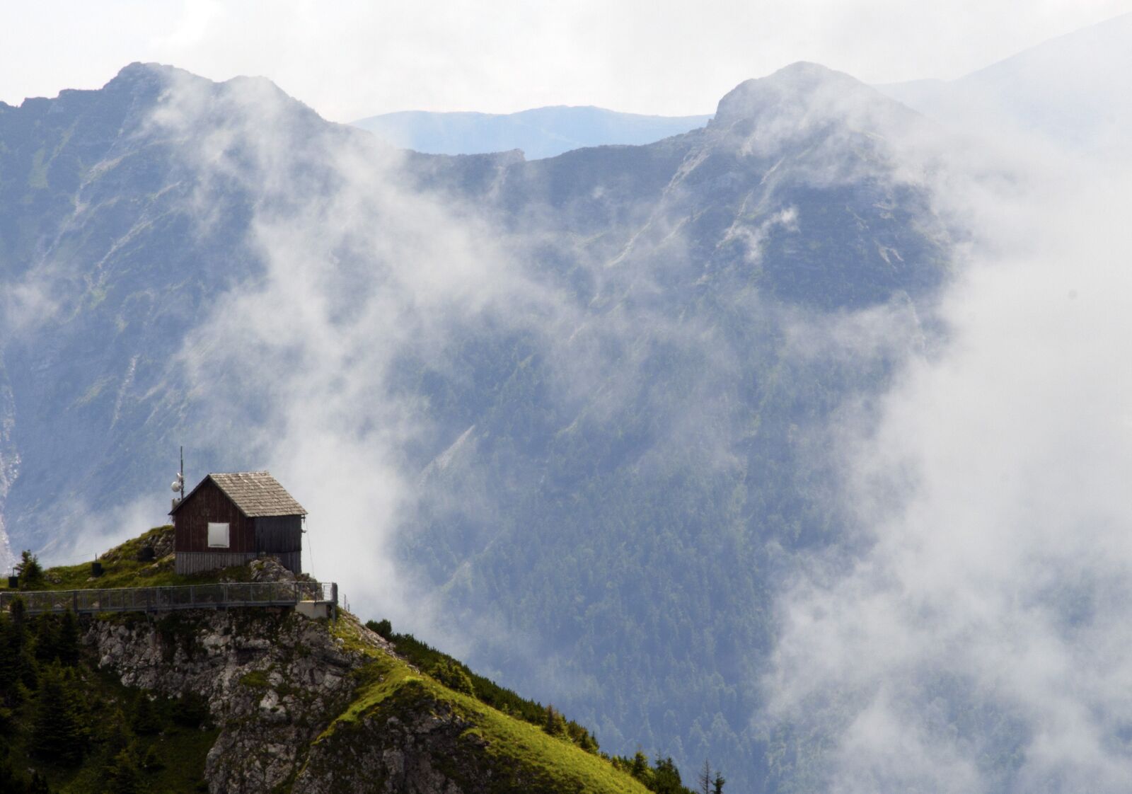 Canon EF-S 55-250mm F4-5.6 IS STM sample photo. Cloud, mountains, house photography