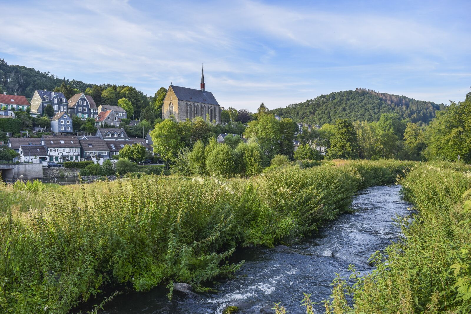 Nikon D3300 sample photo. River, mountain, houses photography