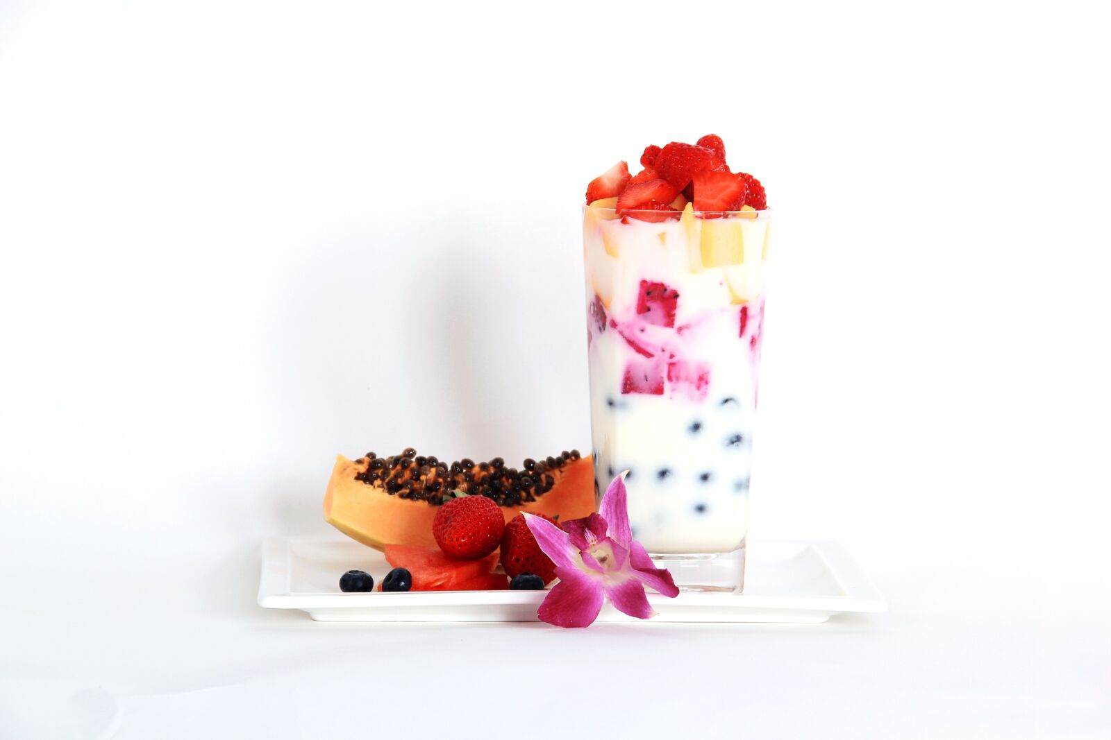 Canon EF-S 18-135mm F3.5-5.6 IS sample photo. Fruit, yogurt, papaya photography
