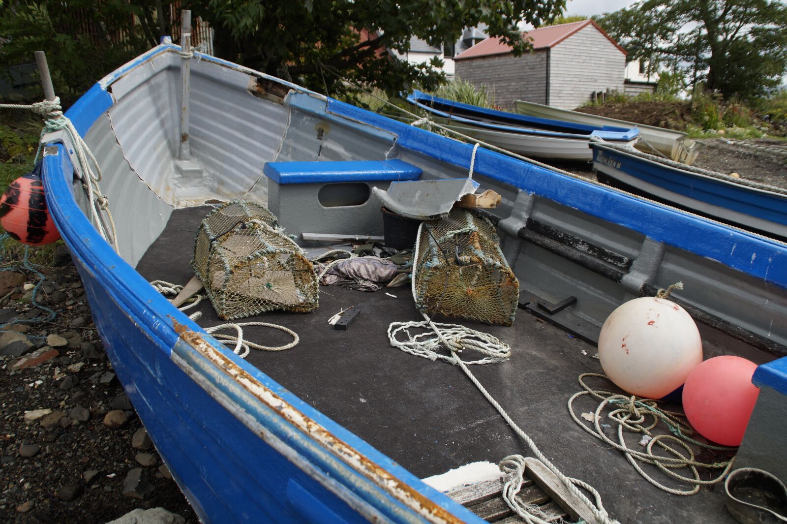 Sony SLT-A58 sample photo. Fishing boat, fish traps photography