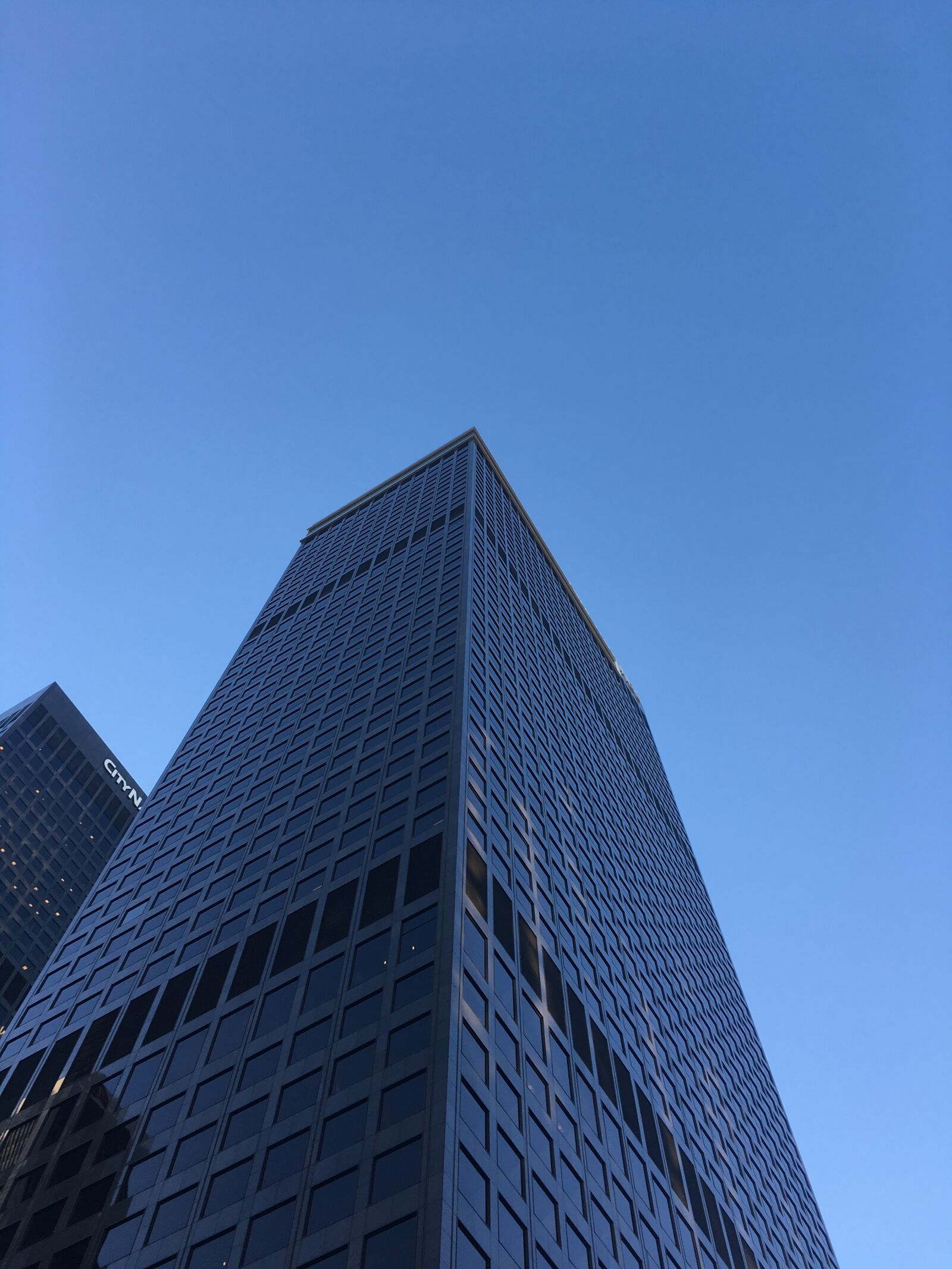 iPhone 6s Plus back camera 4.15mm f/2.2 sample photo. Building, skyscraper, city photography