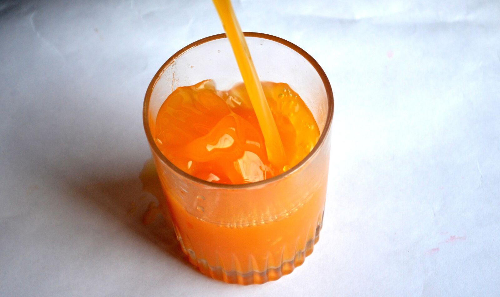 Nikon D5100 sample photo. Orange juice, glass, juice photography