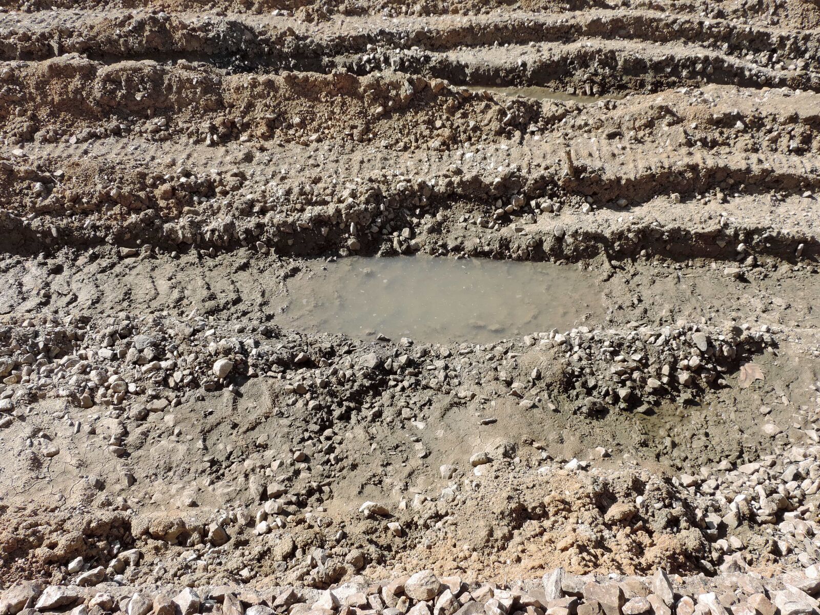 Nikon Coolpix P520 sample photo. Wasteland, mud, stone, soil photography