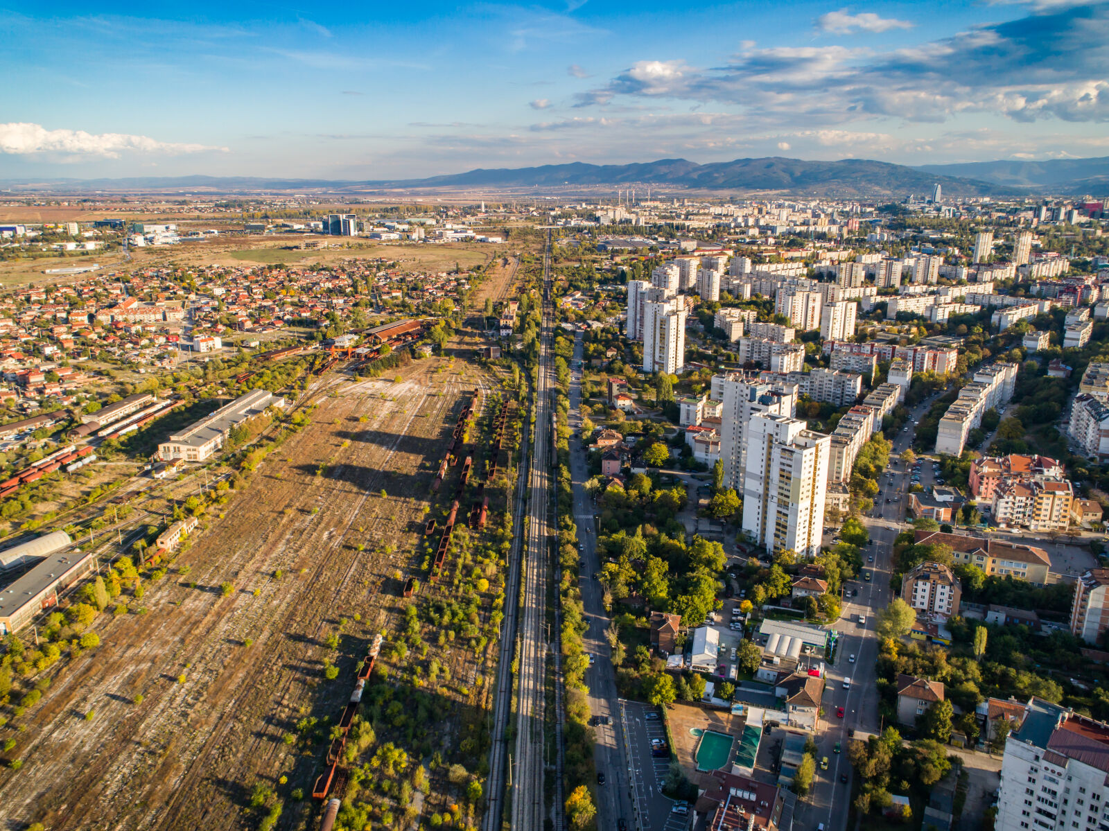 DJI FC6310 sample photo. Apartment, buildings, autumn, blue photography