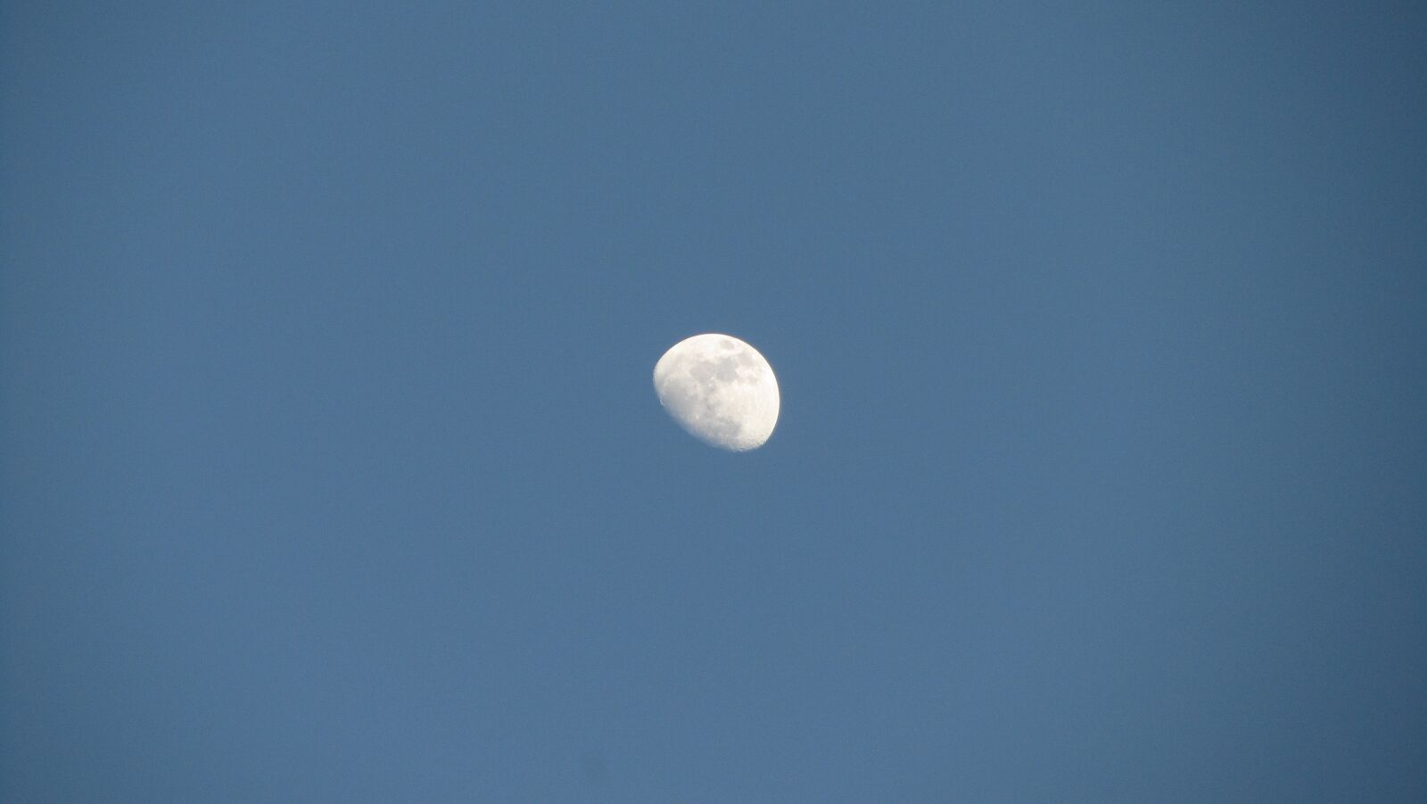 Canon PowerShot SX210 IS sample photo. Moon, blue sky, daytime photography
