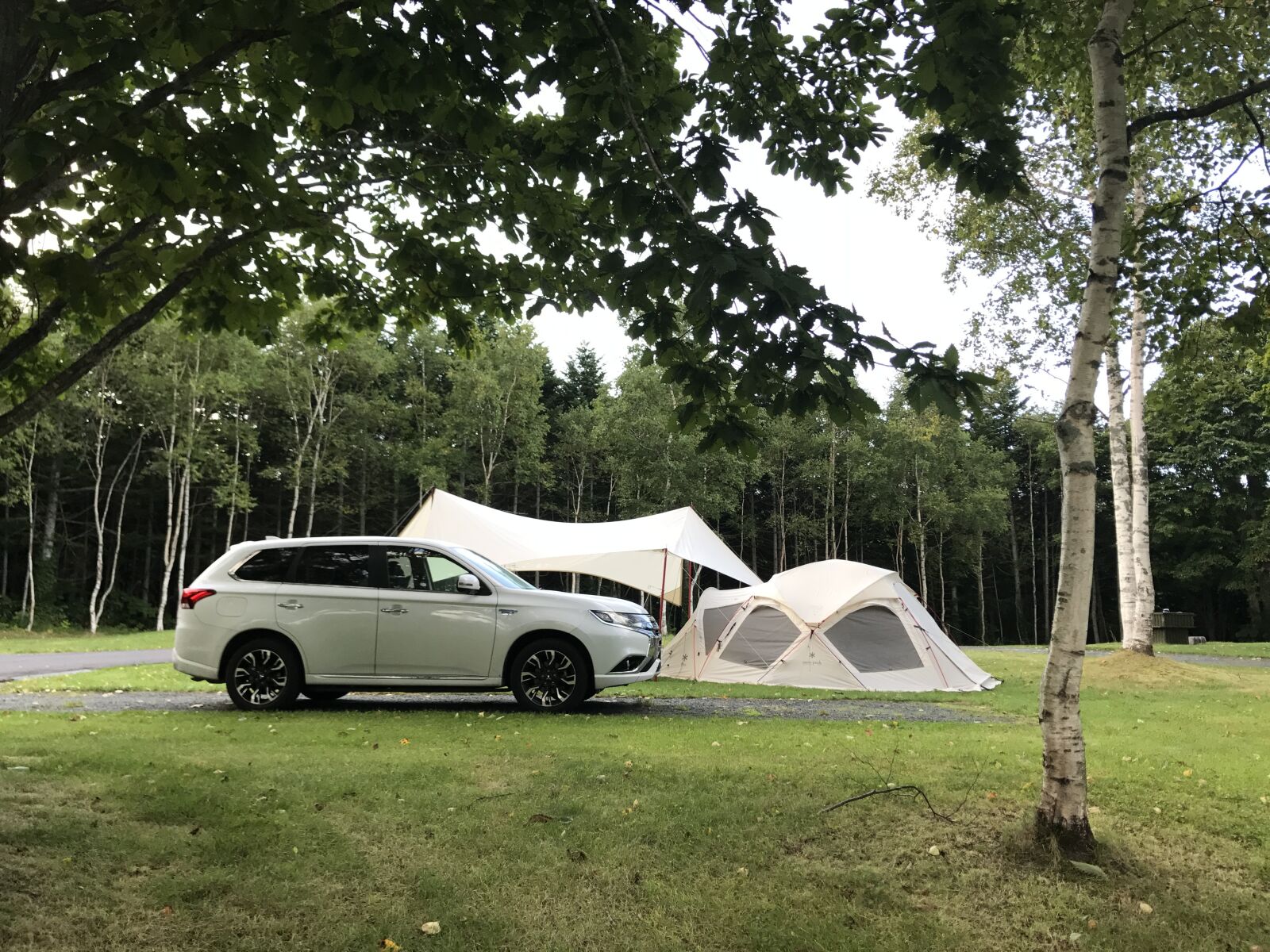 Apple iPhone 7 sample photo. Camping, tent, electric vehicles photography