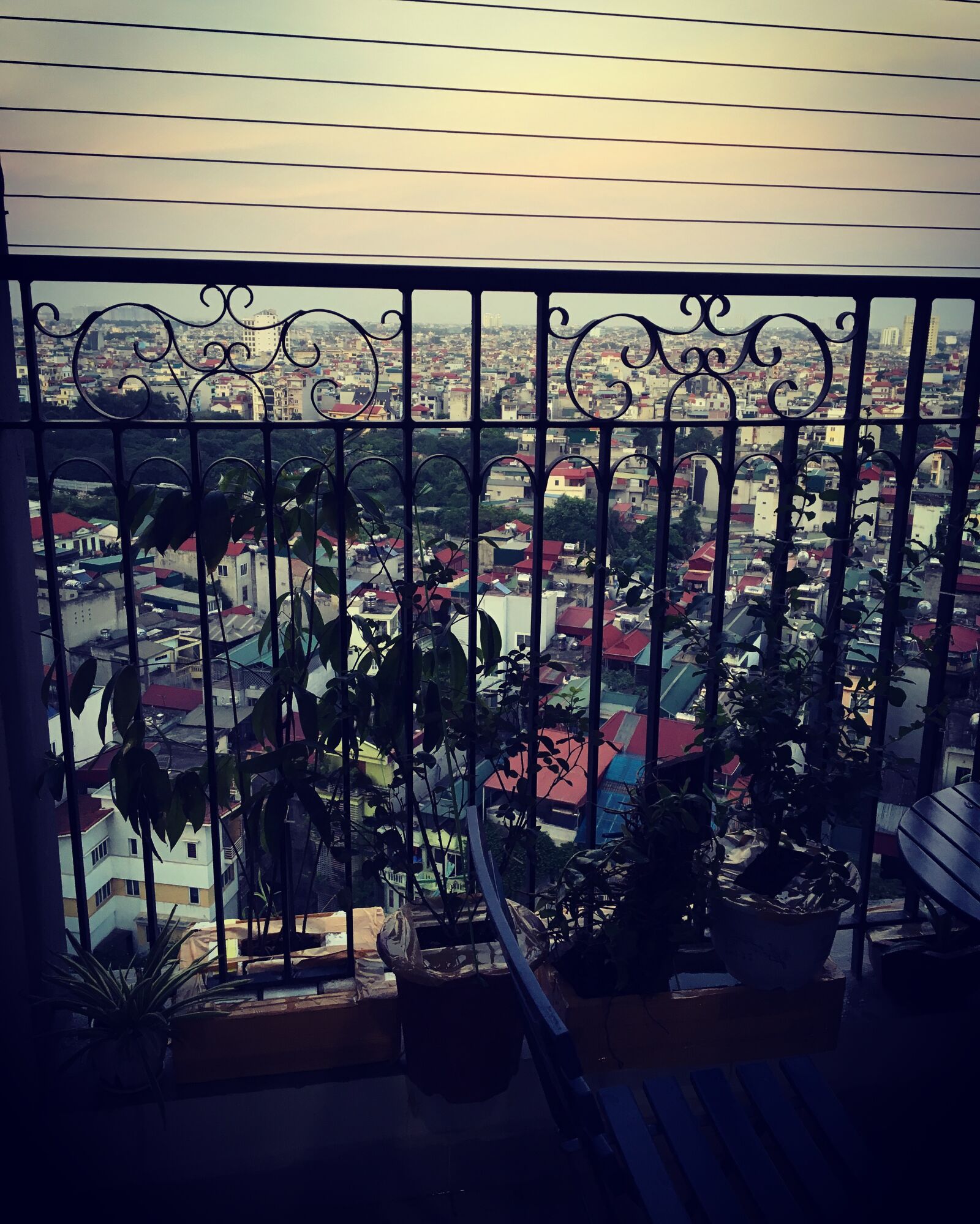 iPhone 6s back camera 4.15mm f/2.2 sample photo. Balcony, city, apartment photography