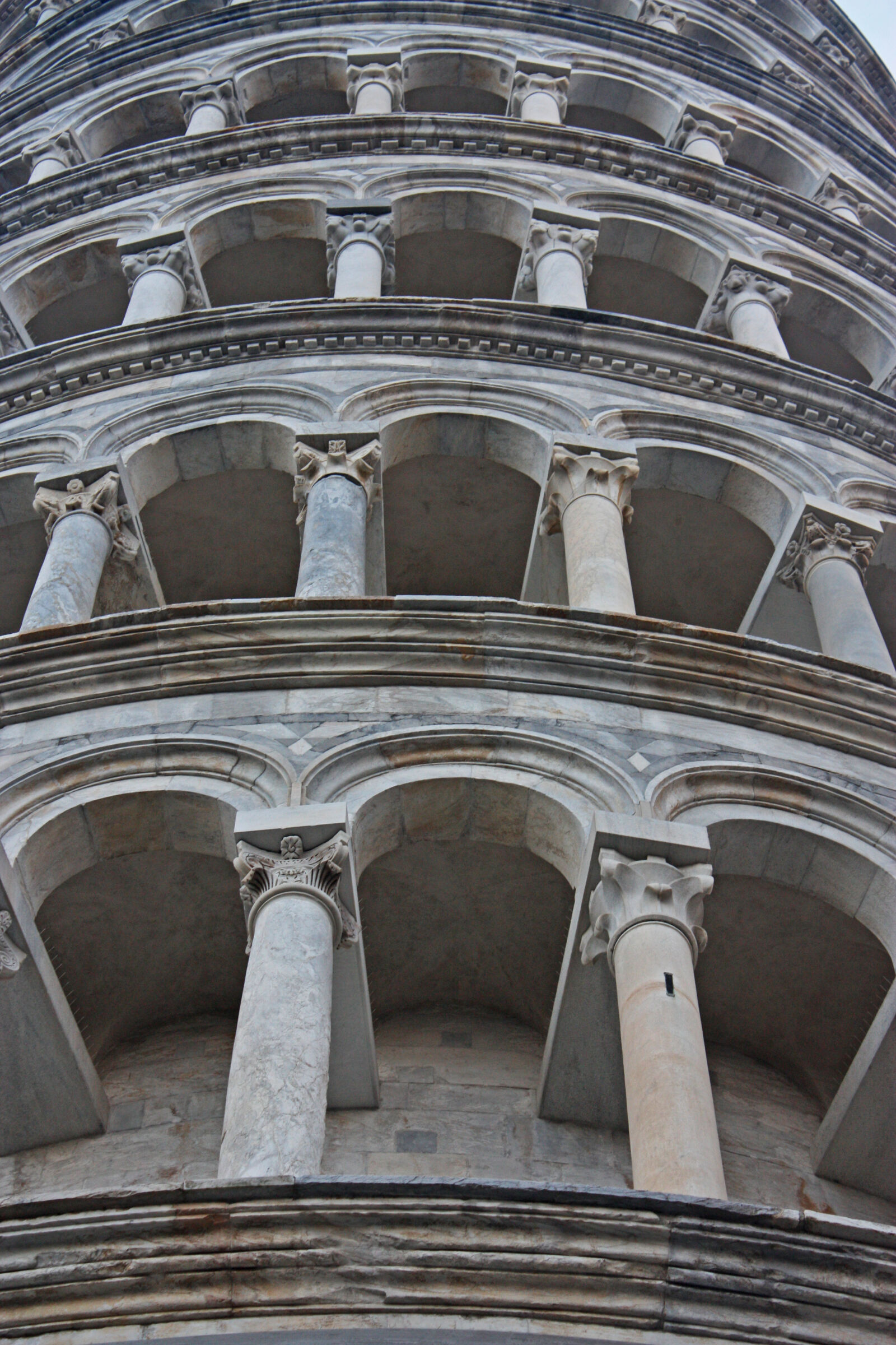 Canon EOS 450D (EOS Rebel XSi / EOS Kiss X2) sample photo. Carved, stones, italy, leaning photography