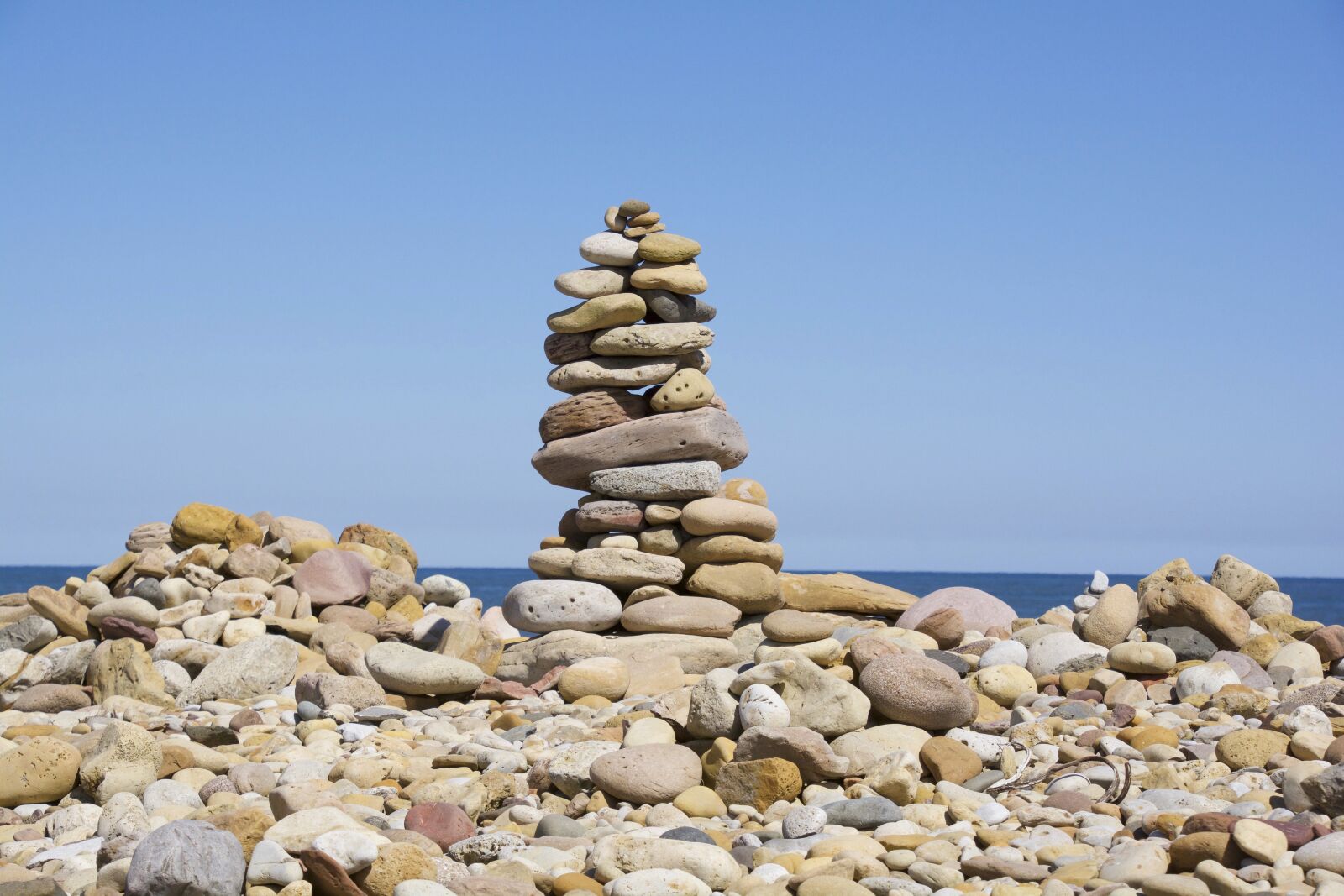 Nikon D7100 sample photo. Stones, pile, beach photography