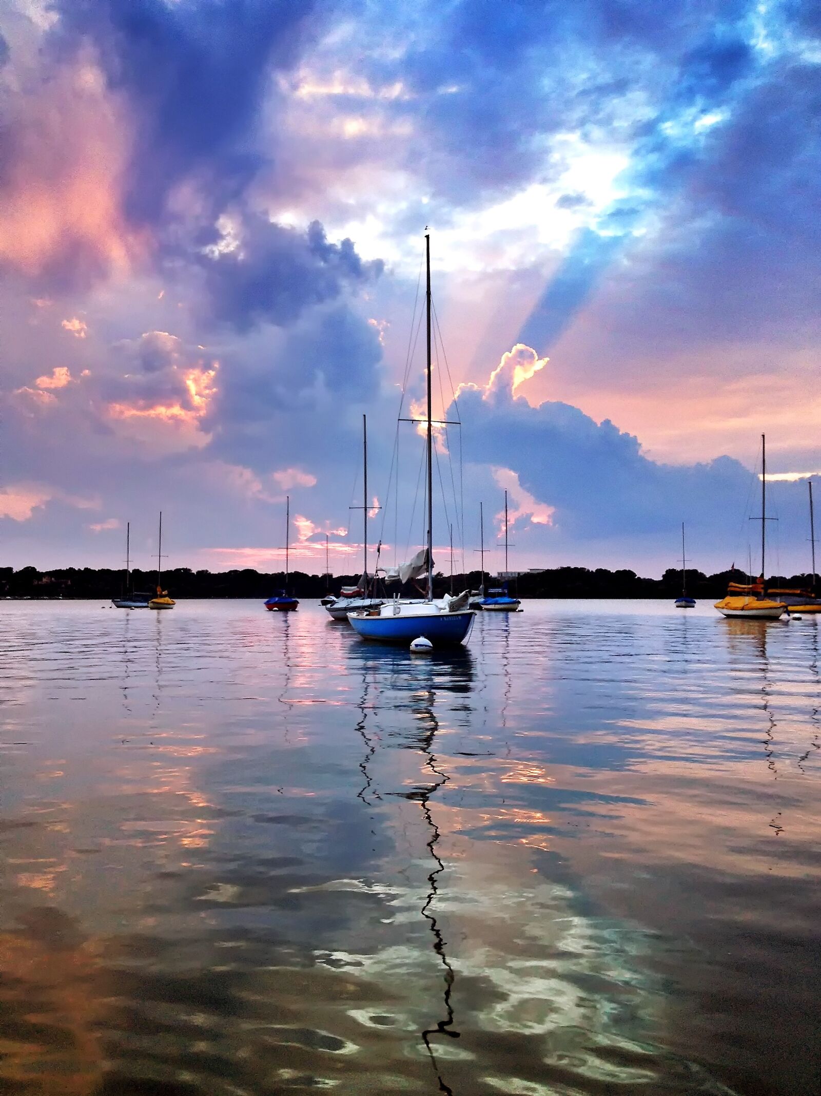 Apple iPhone 4S sample photo. Sunset, boat, water photography