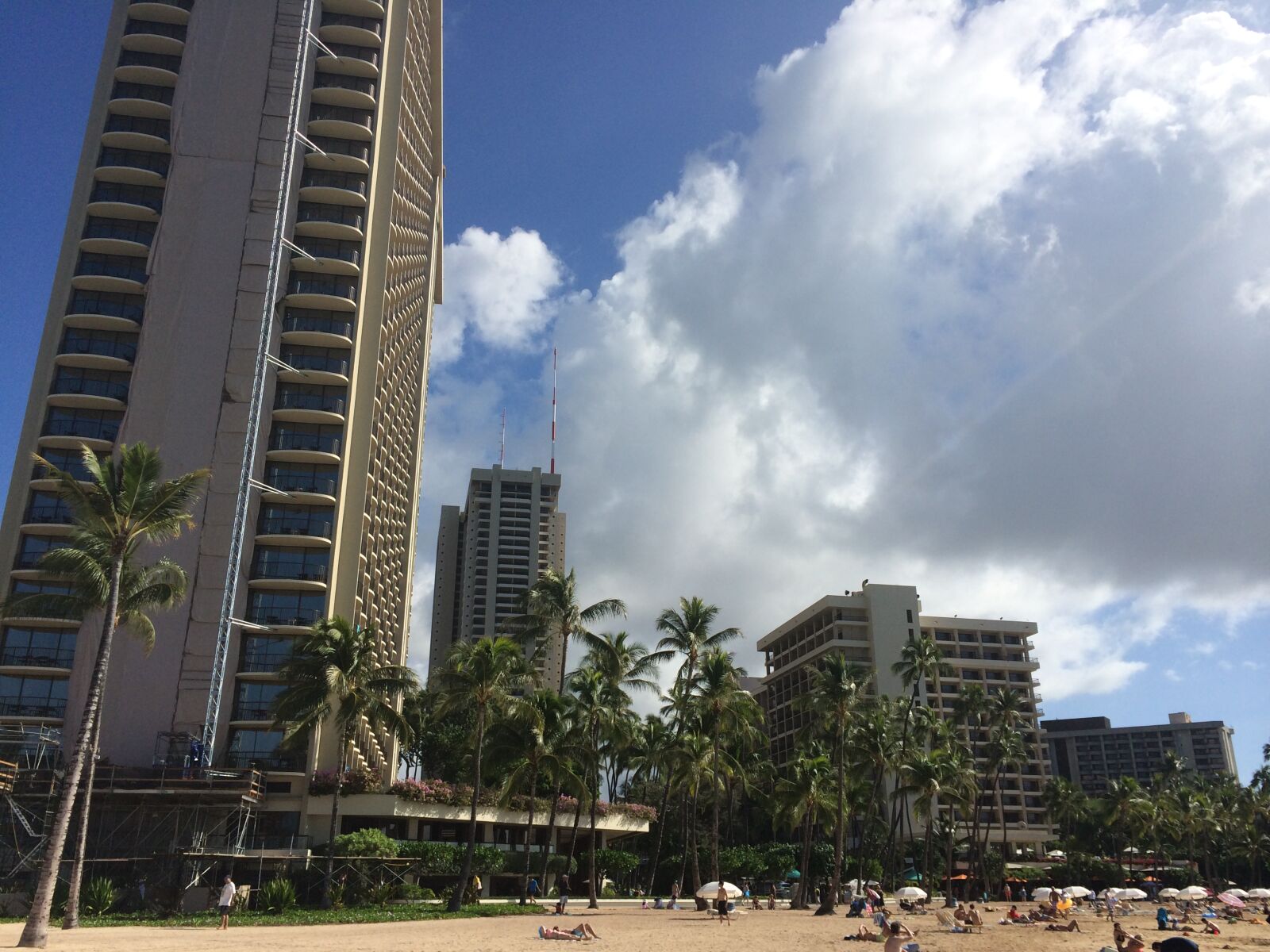 Apple iPhone 5s + iPhone 5s back camera 4.12mm f/2.2 sample photo. Highrise, on, the, beach photography