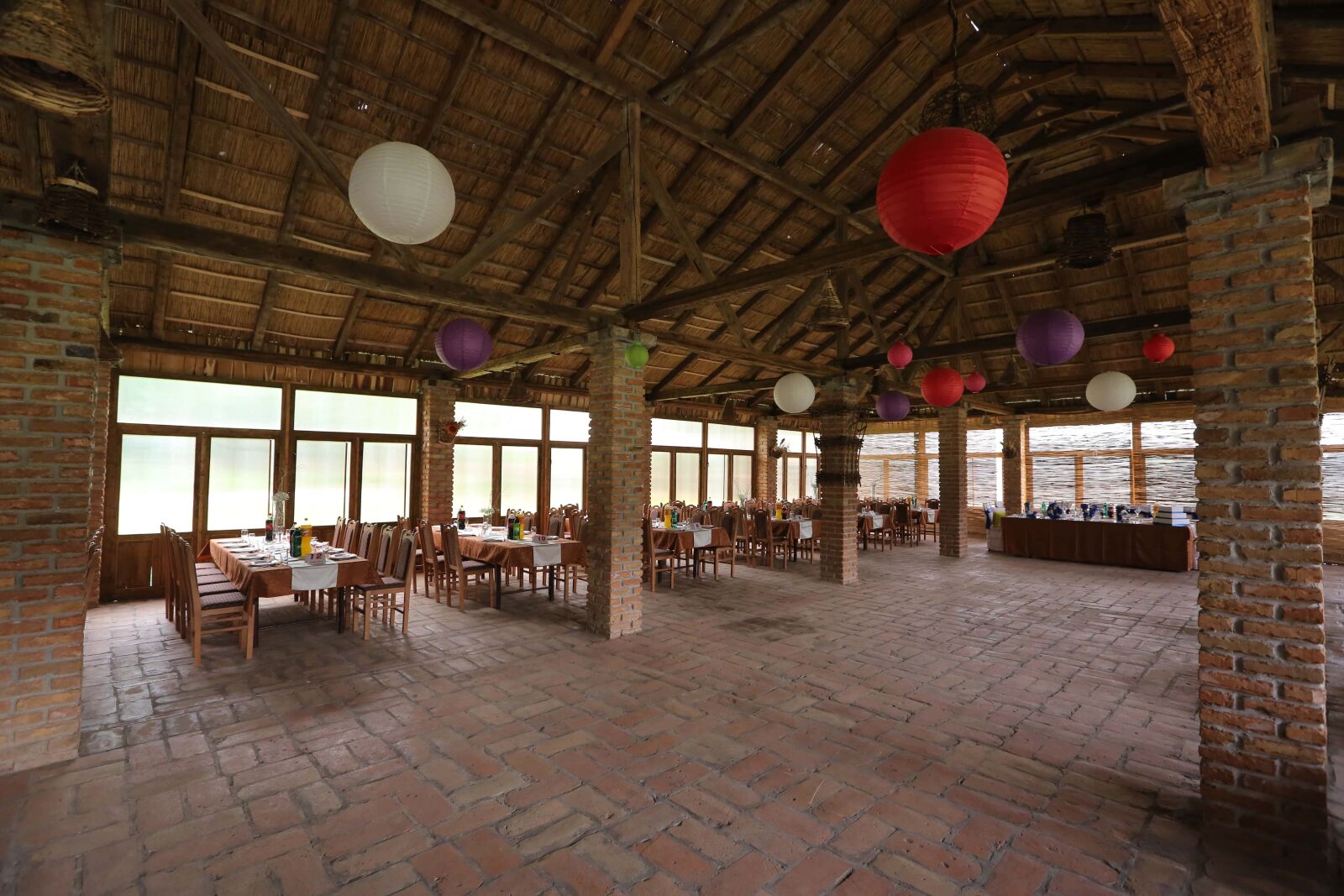 Canon EF 16-35mm F2.8L II USM sample photo. Bricks, ceiling, chairs, floor photography