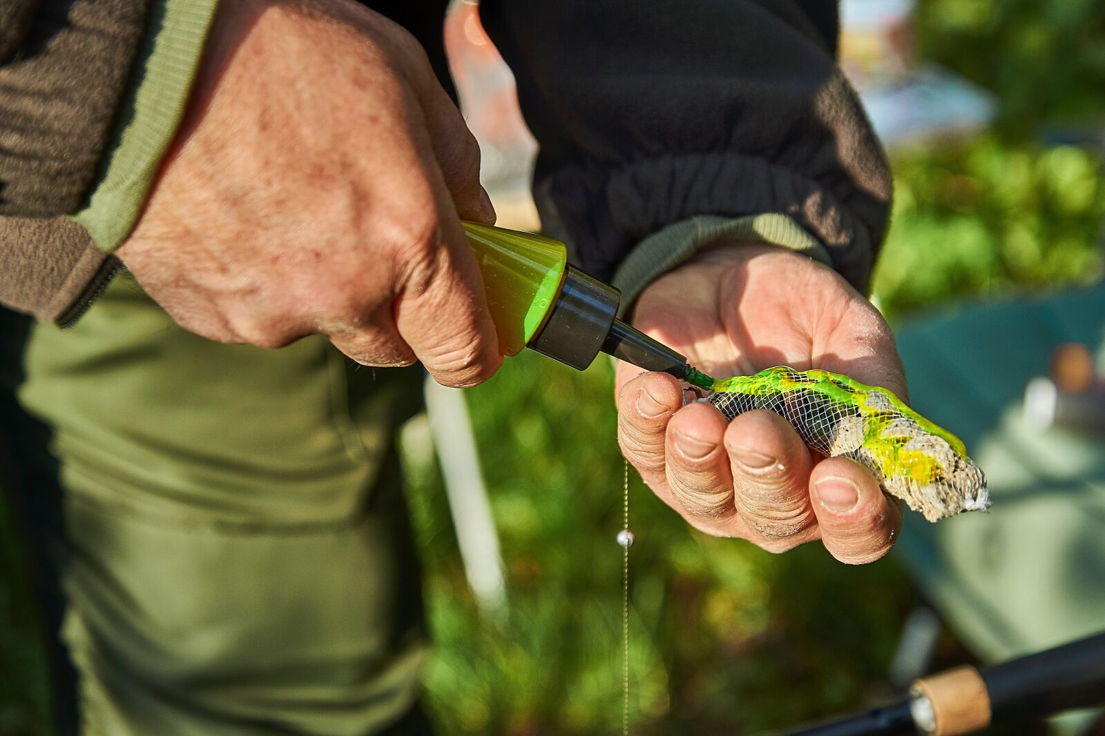 Sony SLT-A77 + Sony DT 16-50mm F2.8 SSM sample photo. Angler, bait, fishing rod photography