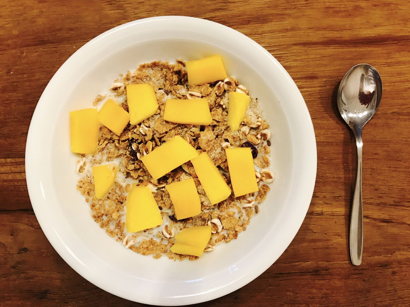 Apple iPhone 7 sample photo. Muesli, mango, delicious photography