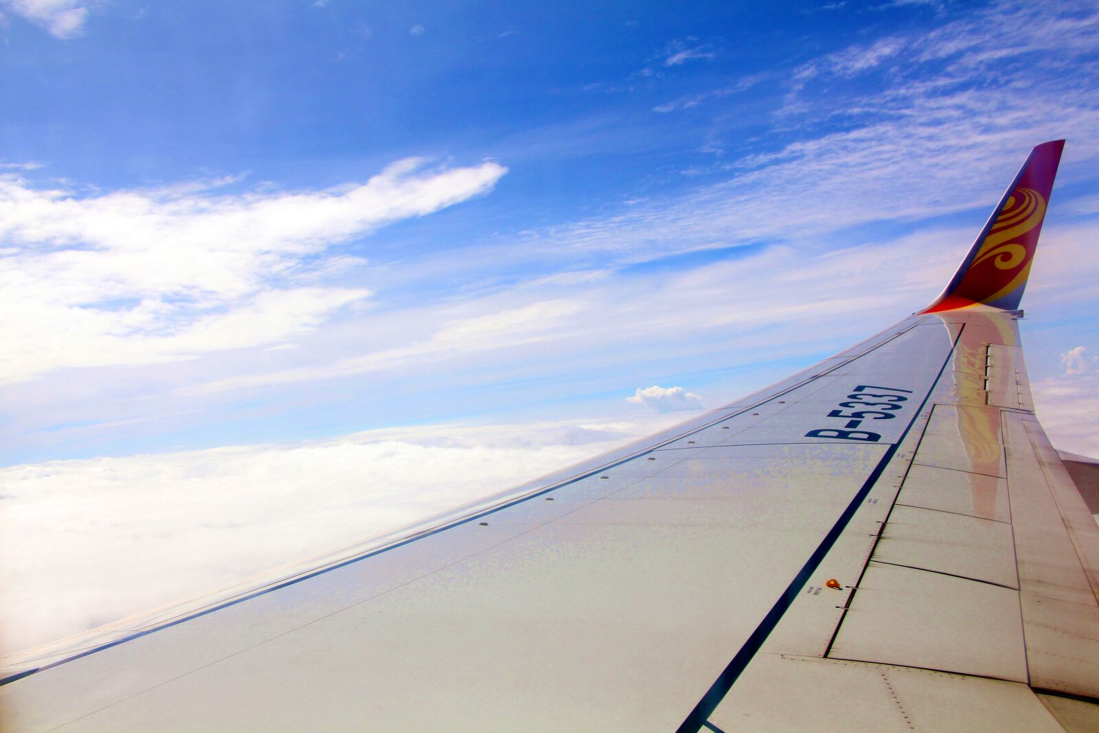 Canon EOS 700D (EOS Rebel T5i / EOS Kiss X7i) sample photo. Aircraft, wing, blue sky photography
