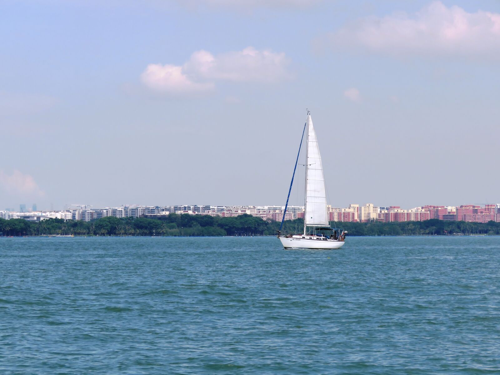 Canon PowerShot SX60 HS sample photo. Boat, island, floating photography