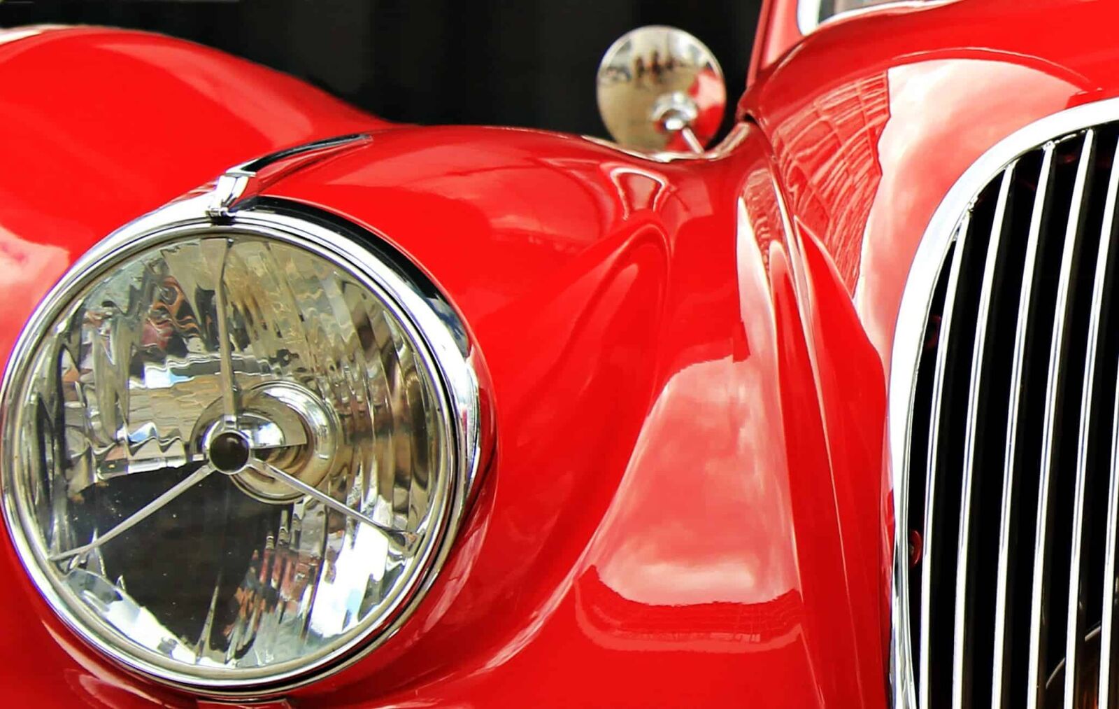 Canon EOS 550D (EOS Rebel T2i / EOS Kiss X4) sample photo. Headlight, red car, paint photography