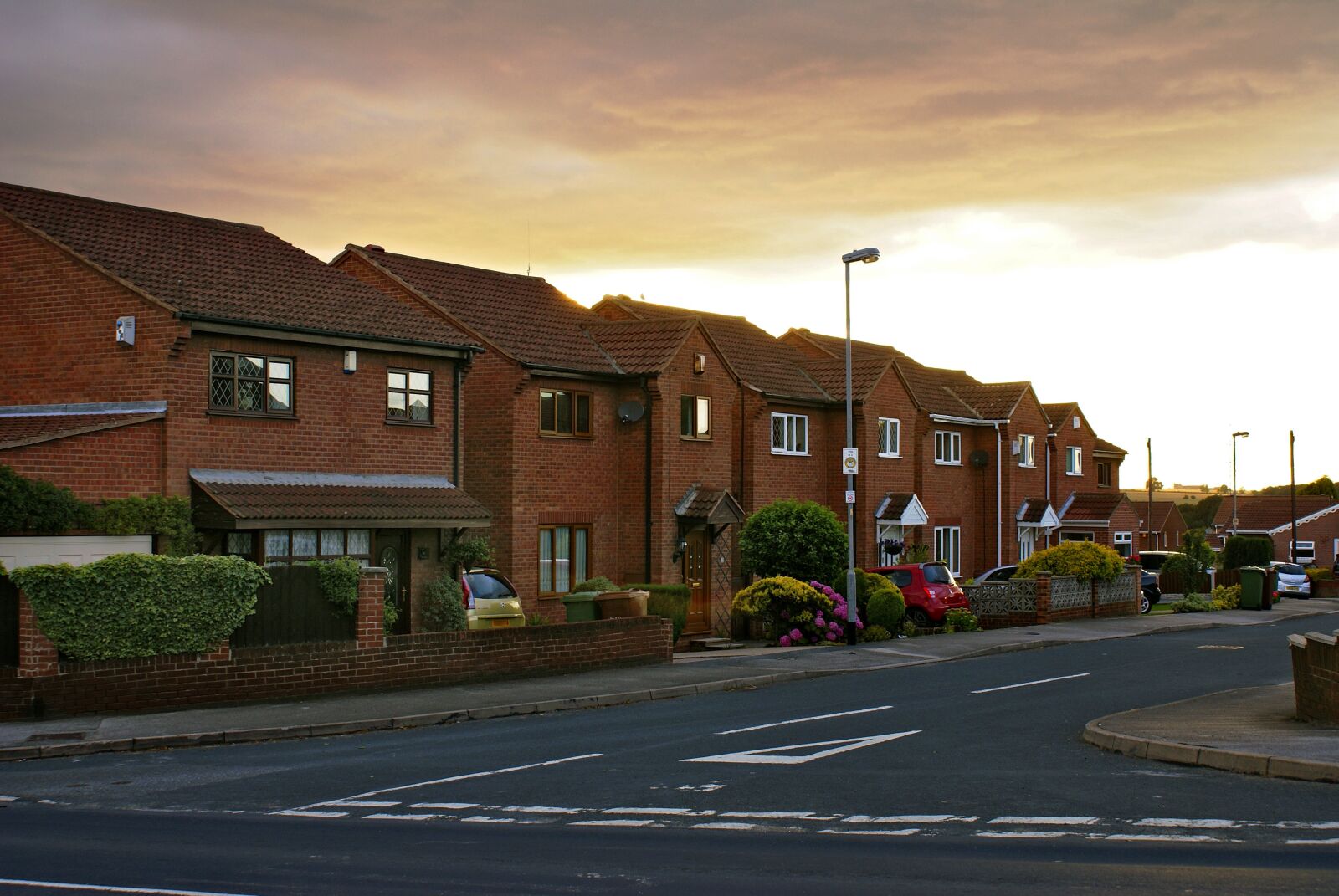 Sony Alpha DSLR-A100 sample photo. Houses, street, osiedle photography