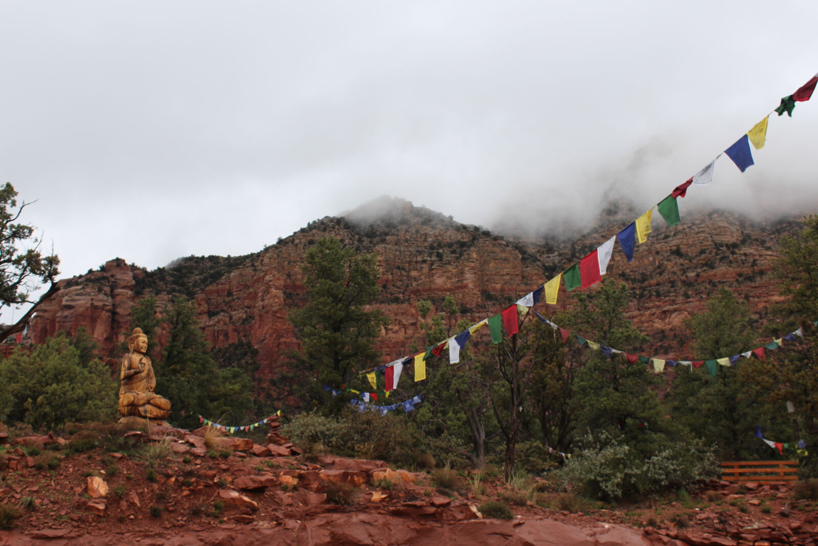 Canon EOS 1200D (EOS Rebel T5 / EOS Kiss X70 / EOS Hi) sample photo. Budha, colors, flags, fog photography