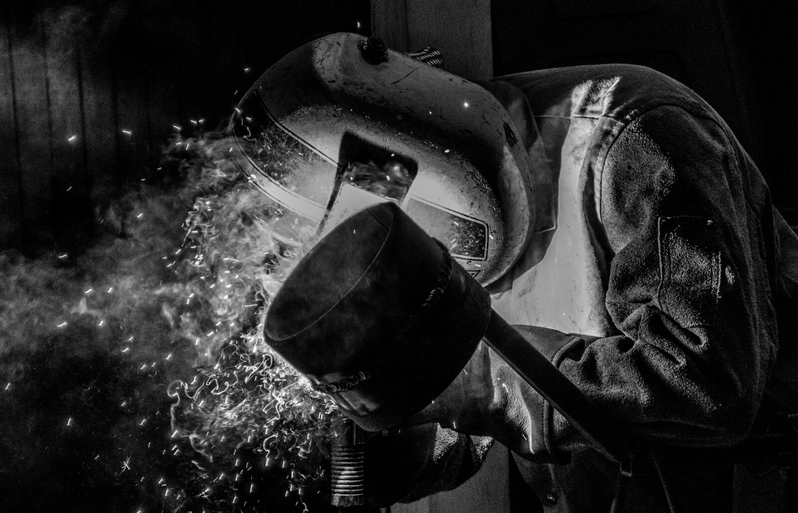 Nikon D5200 sample photo. Welder, black and white photography